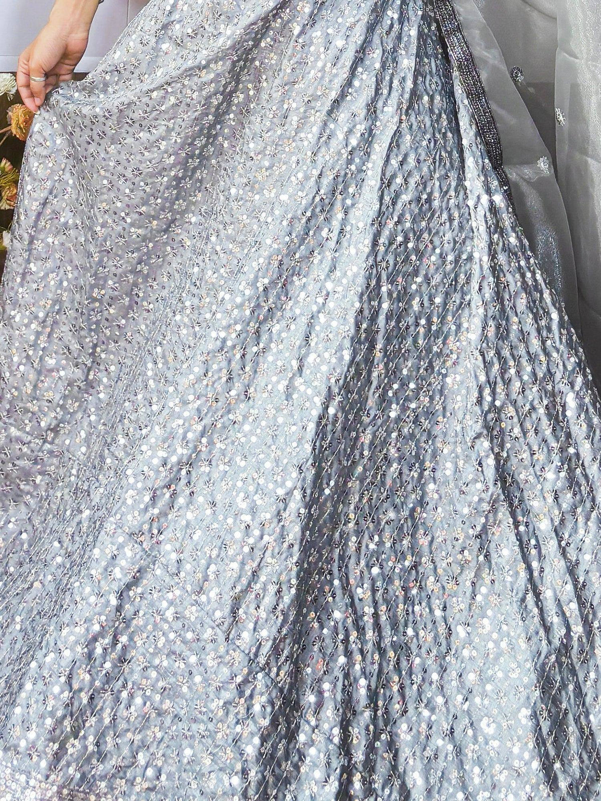 Grey sequin lehenga with floral embroidery, perfect for Indian ethnic wear and festive occasions.