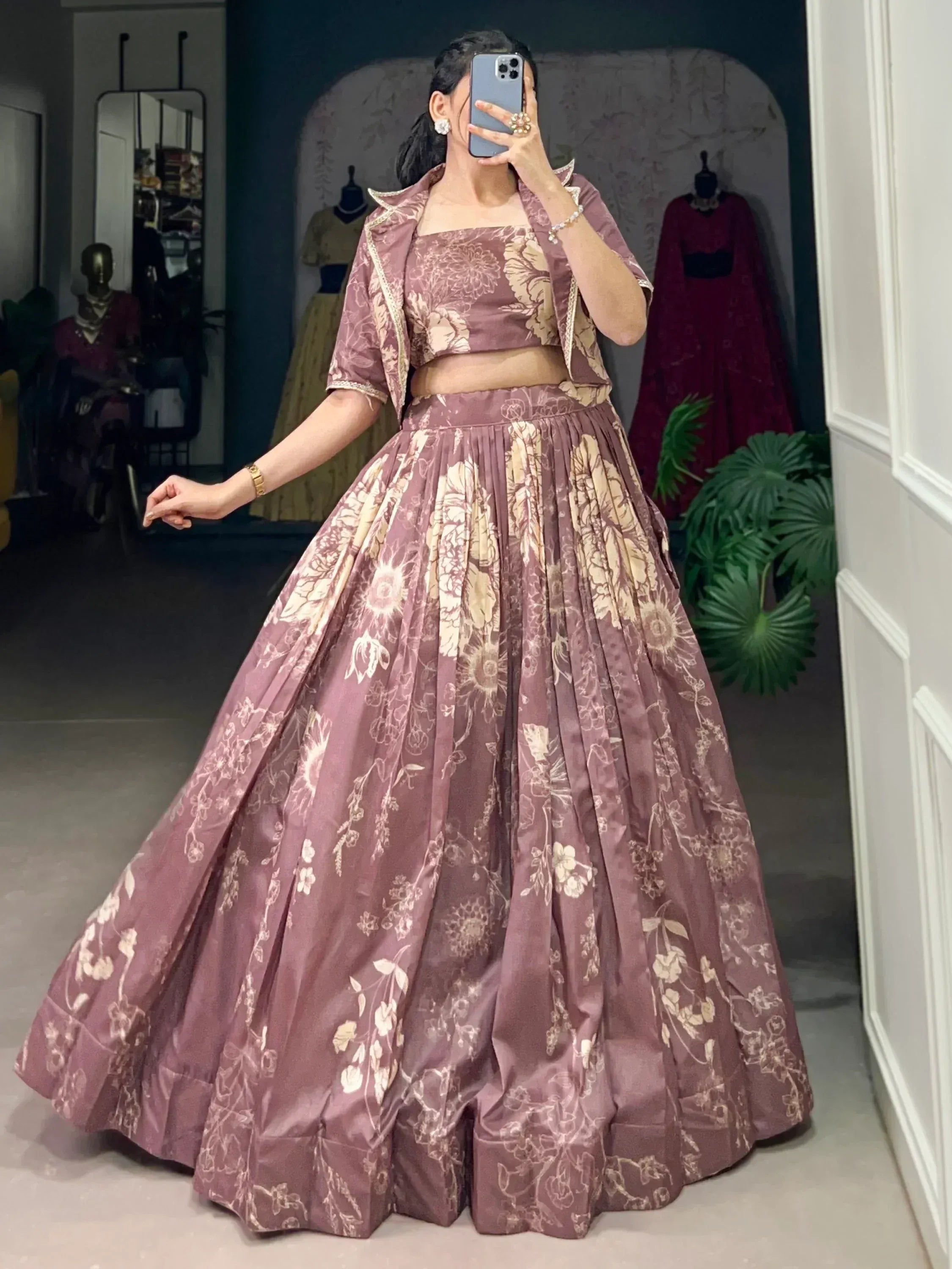 Mauve floral lehenga choli with matching jacket, perfect for Indian ethnic occasions and weddings.