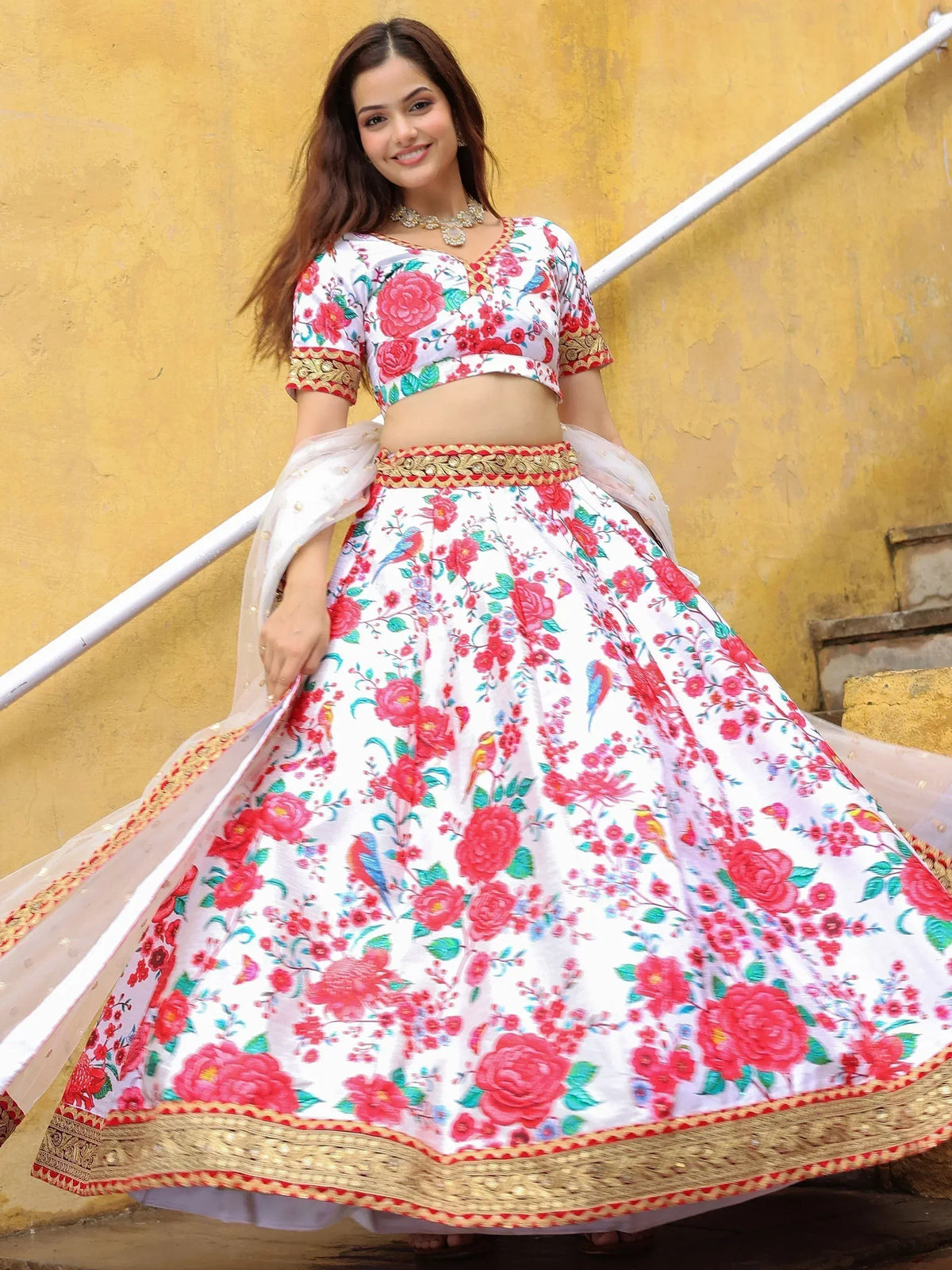 White floral lehenga choli with pink roses and birds, gold border, perfect for Indian ethnic occasions
