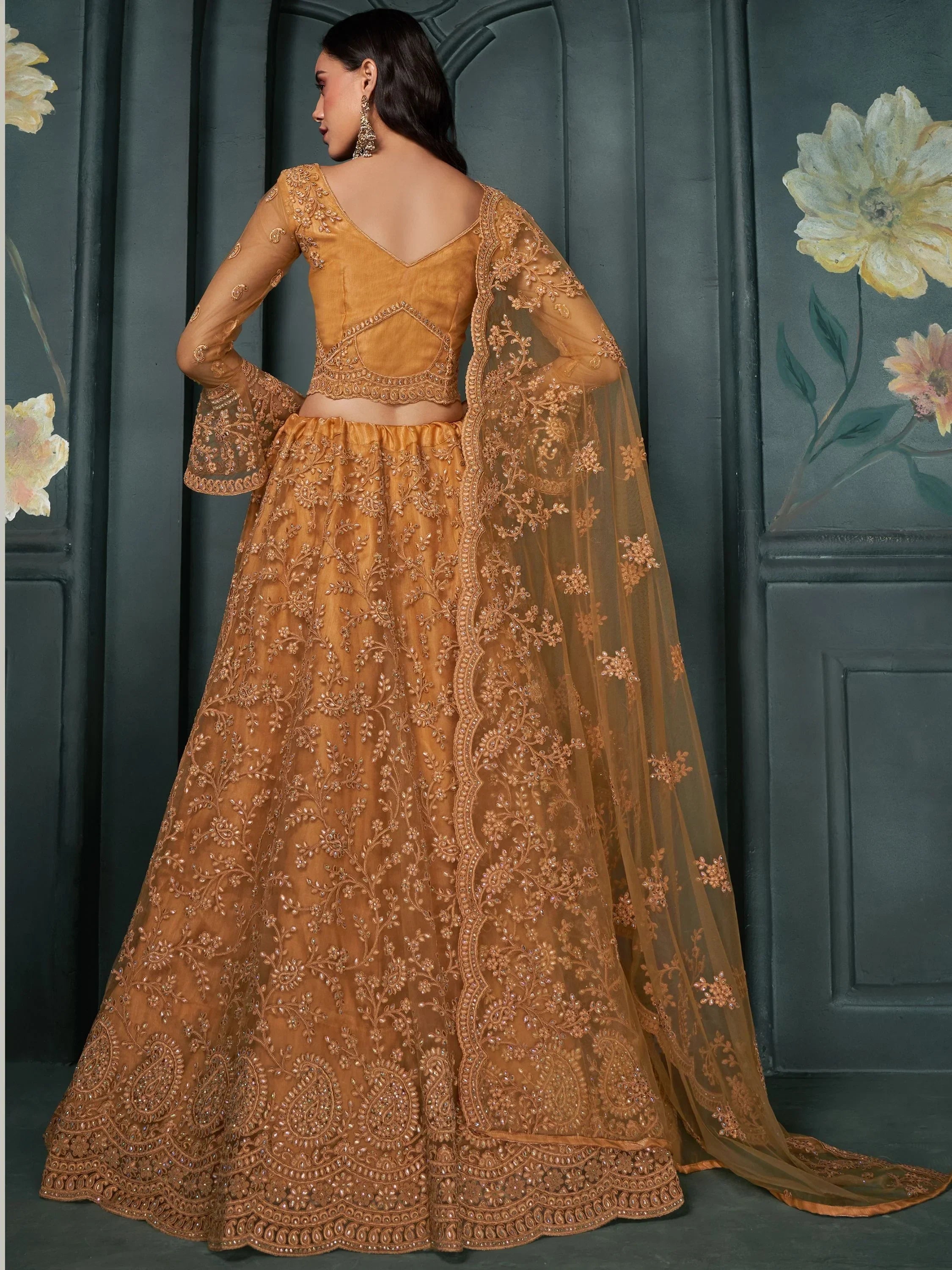 Golden embroidered lehenga choli with sheer dupatta, Indian ethnic wear for weddings and parties