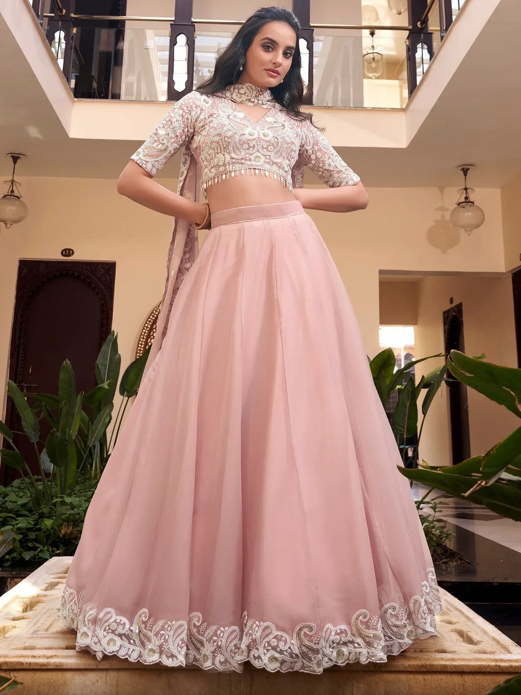 Pink embroidered lehenga choli with lace blouse and dupatta, perfect for Indian ethnic wear occasions