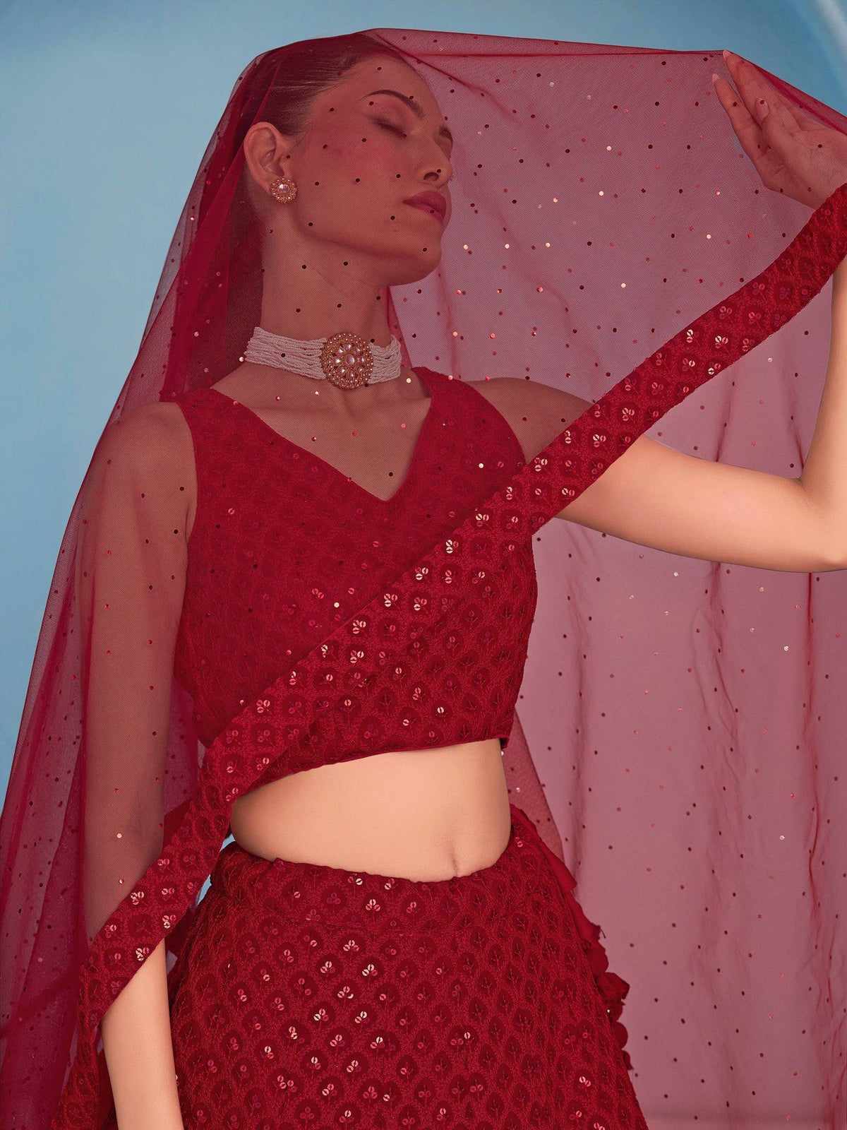 Red sequin lehenga choli with sheer dupatta, ethnic Indian wear for weddings and festivals