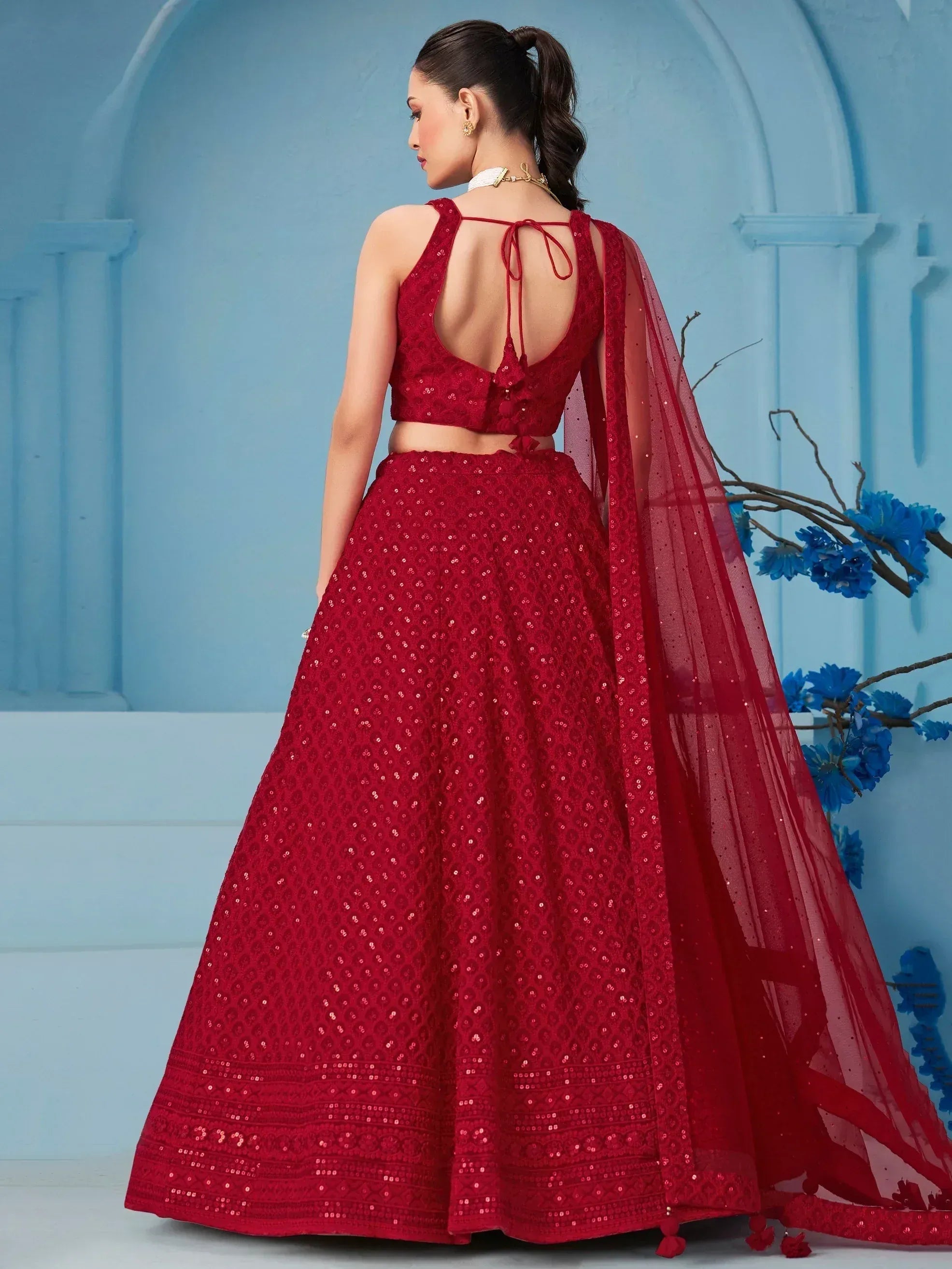 Red sequin lehenga choli with back tie blouse and sheer dupatta, ethnic Indian wear