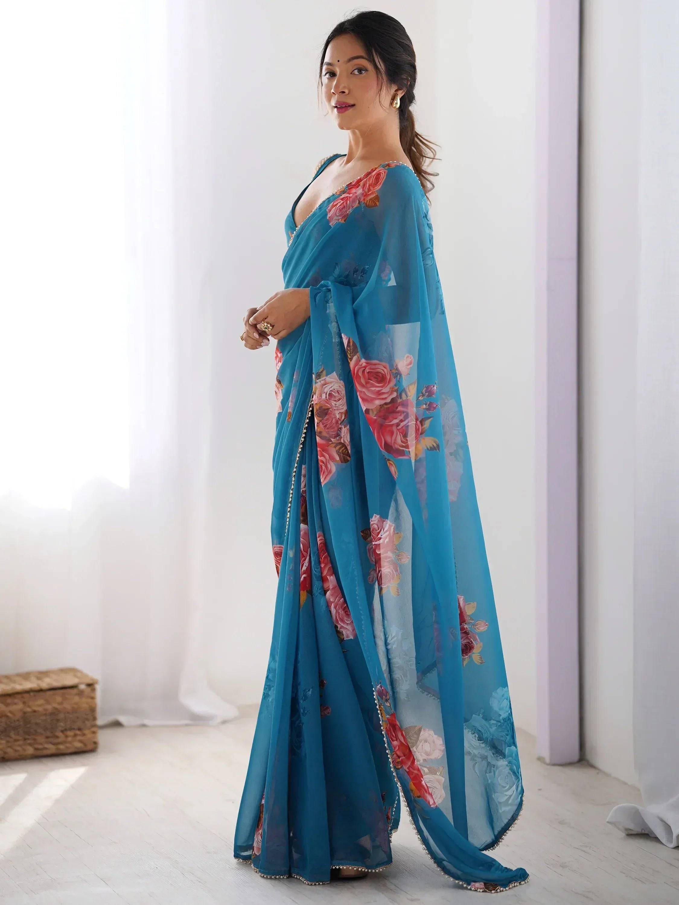 Blue floral printed saree with pearl border, elegant Indian ethnic wear for women