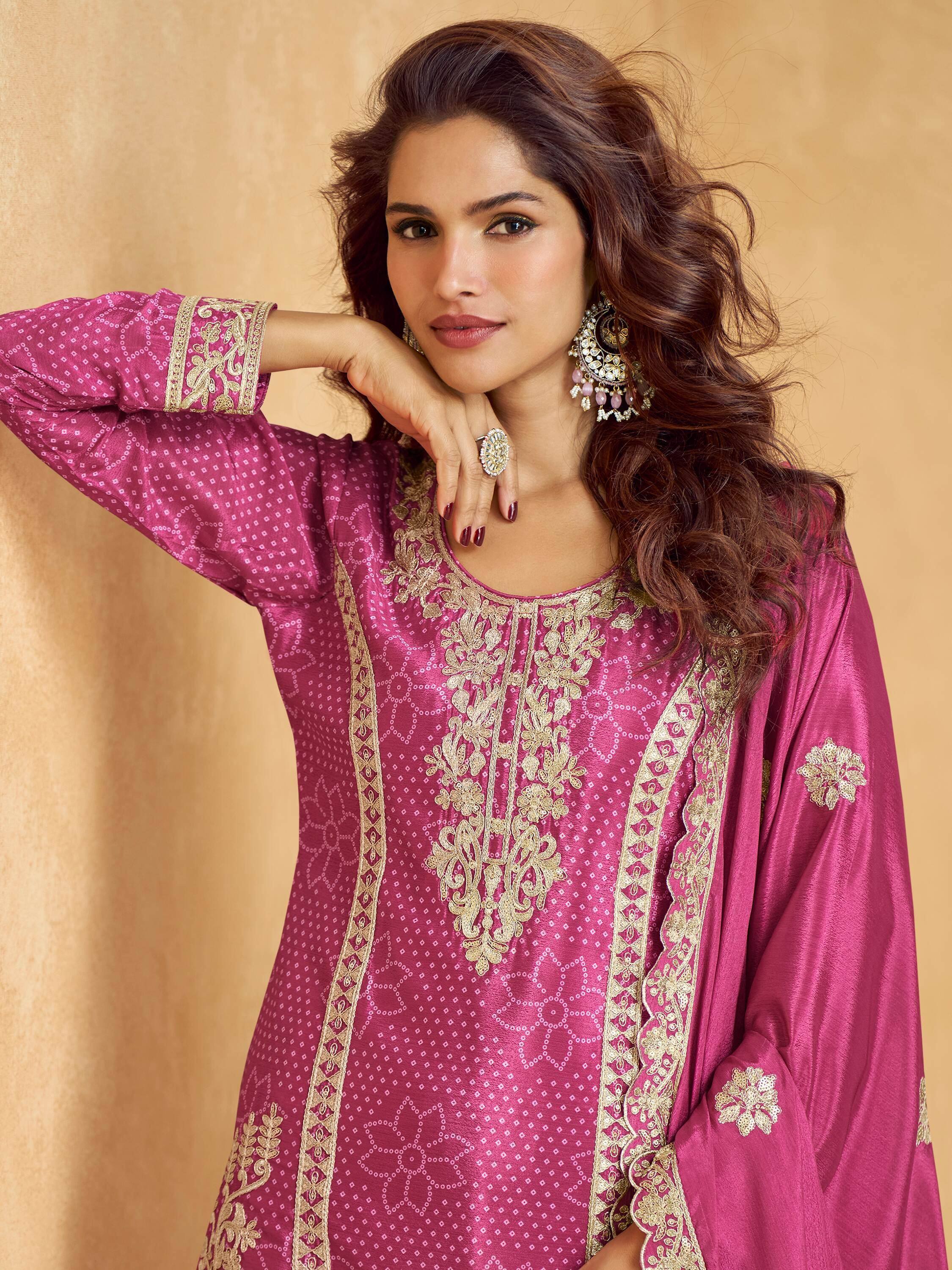 Pink ethnic kurti with gold embroidery, perfect for Indian festive wear and designer occasions.