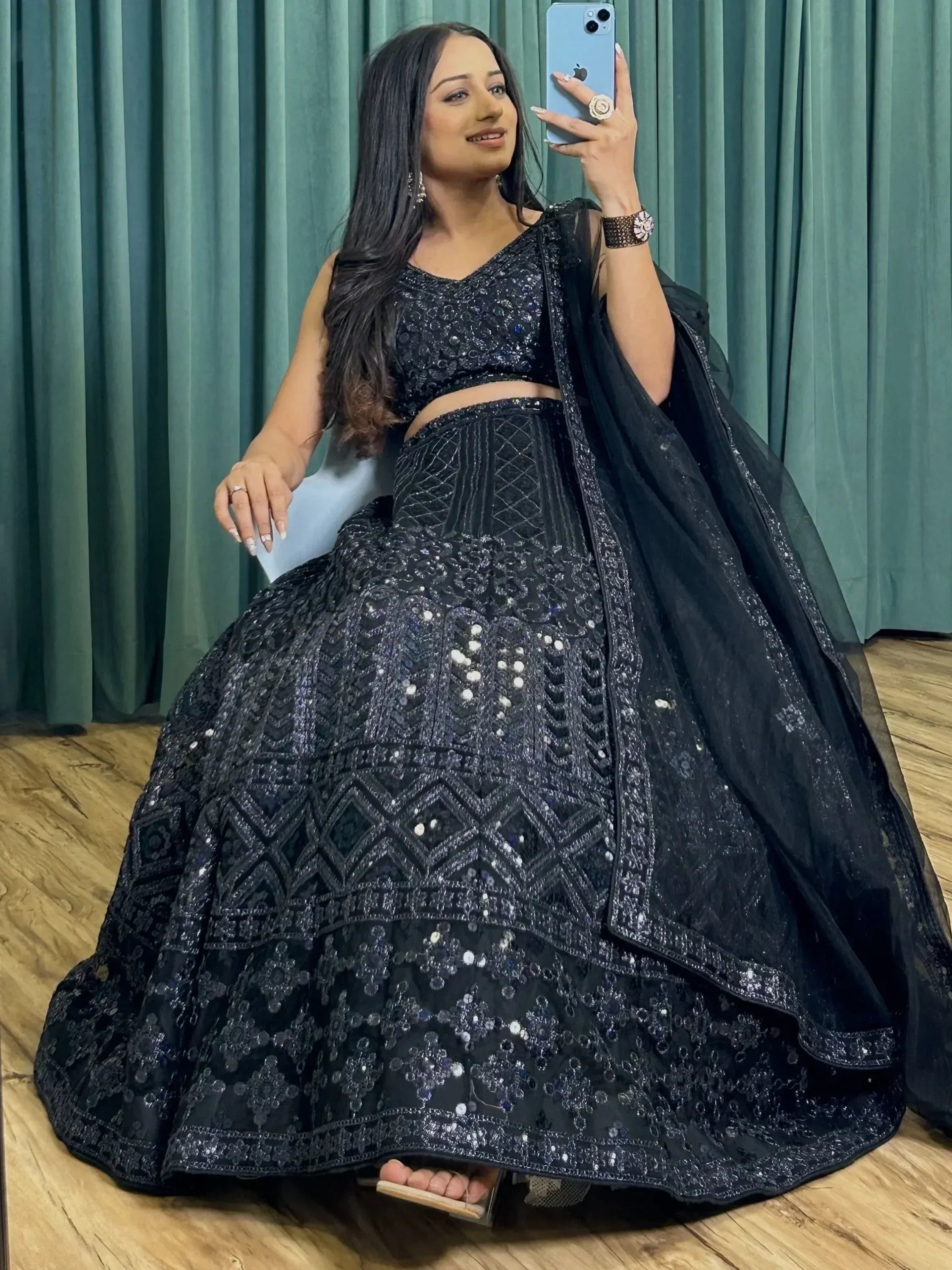 Black sequined lehenga choli with heavy embroidery, perfect for Indian ethnic wear events