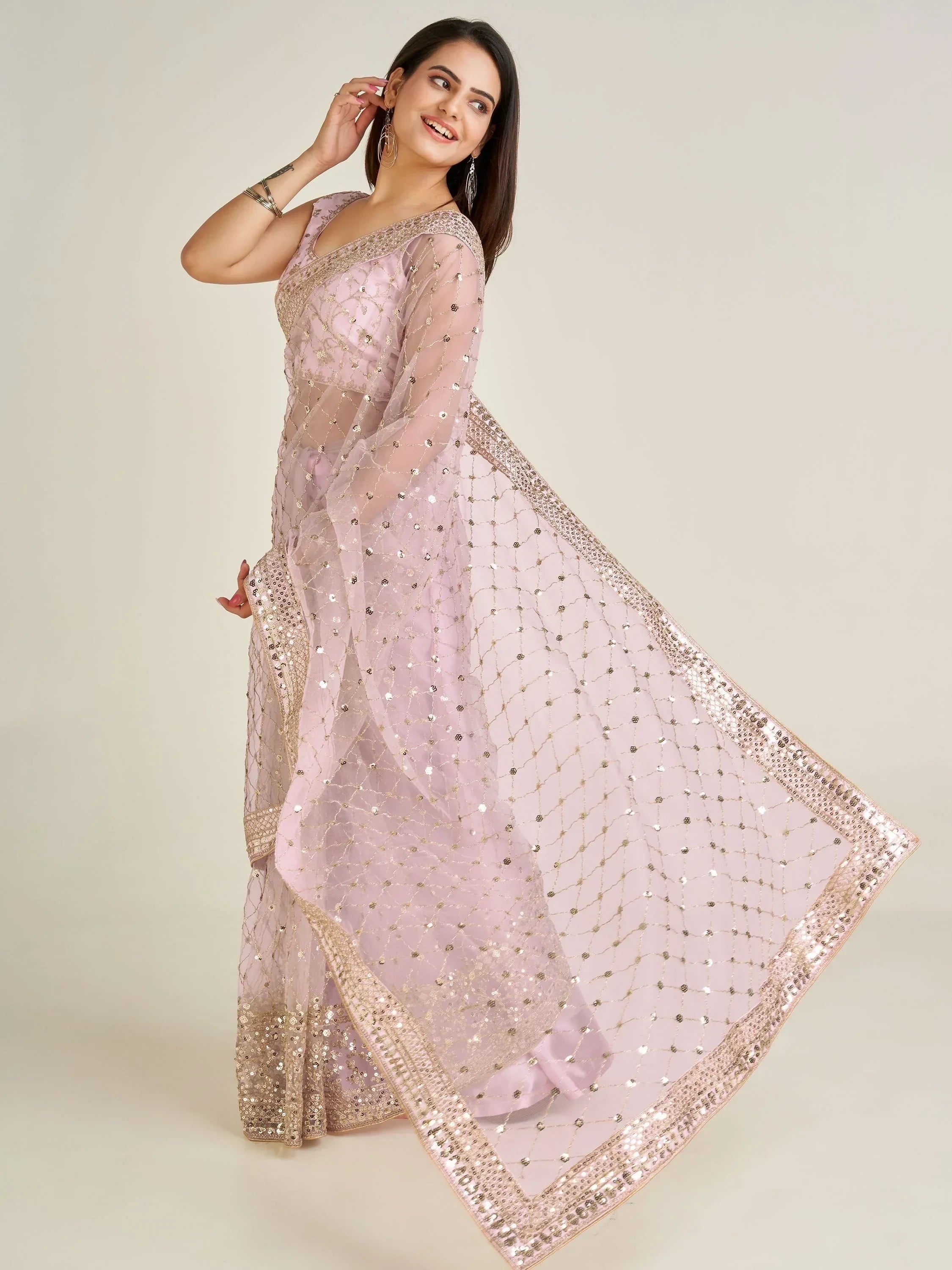 Glamorous Light Pink Sequins Net Wedding Wear Saree With Blouse