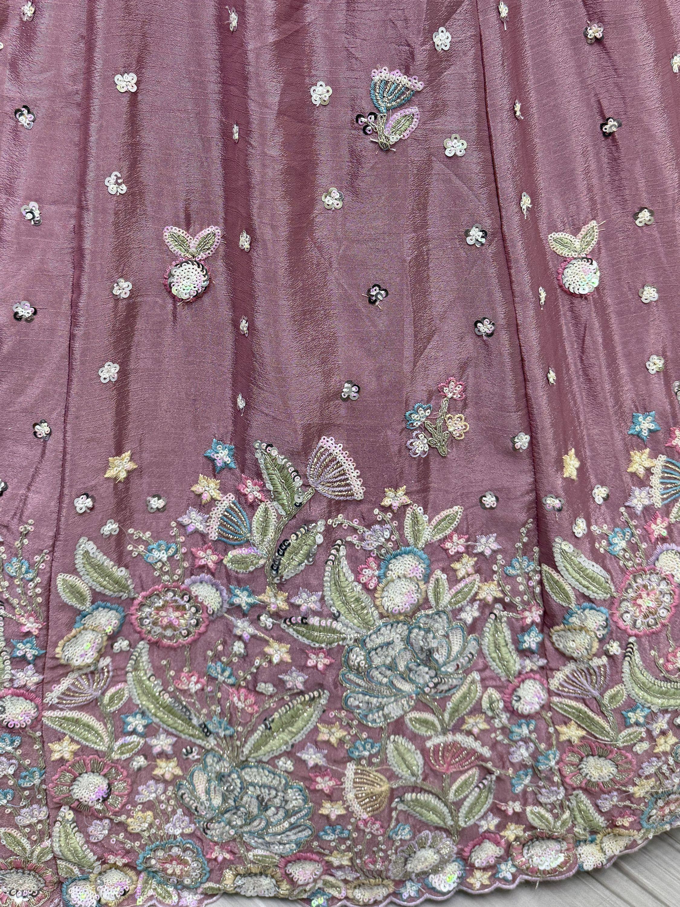 Mauve ethnic gown with floral sequin embroidery and detailed border design