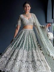 Alluring Green Sequins Net Engagement Wear Lehenga Choli With Dupatta
