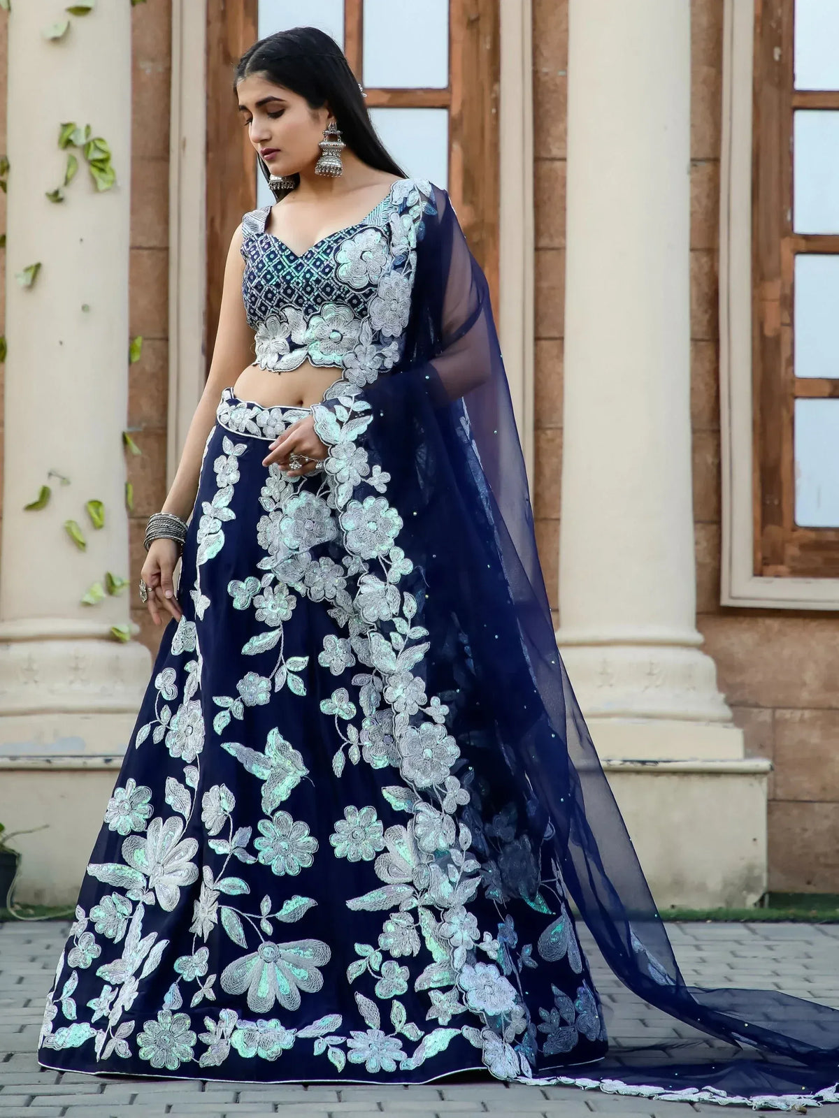 Navy blue lehenga choli with floral embroidery, perfect for Indian ethnic wear events