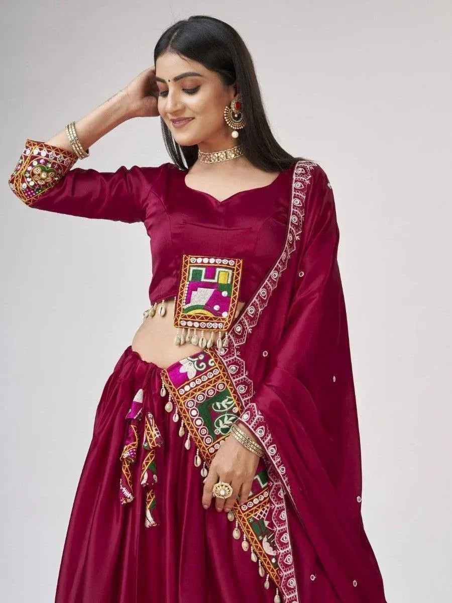 Maroon ethnic lehenga choli with mirror work and embroidery, perfect for Indian weddings and festivals