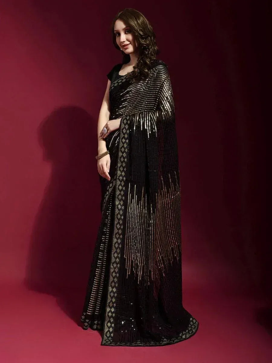 Black sequined saree with gold embroidery, elegant Indian ethnic wear for women