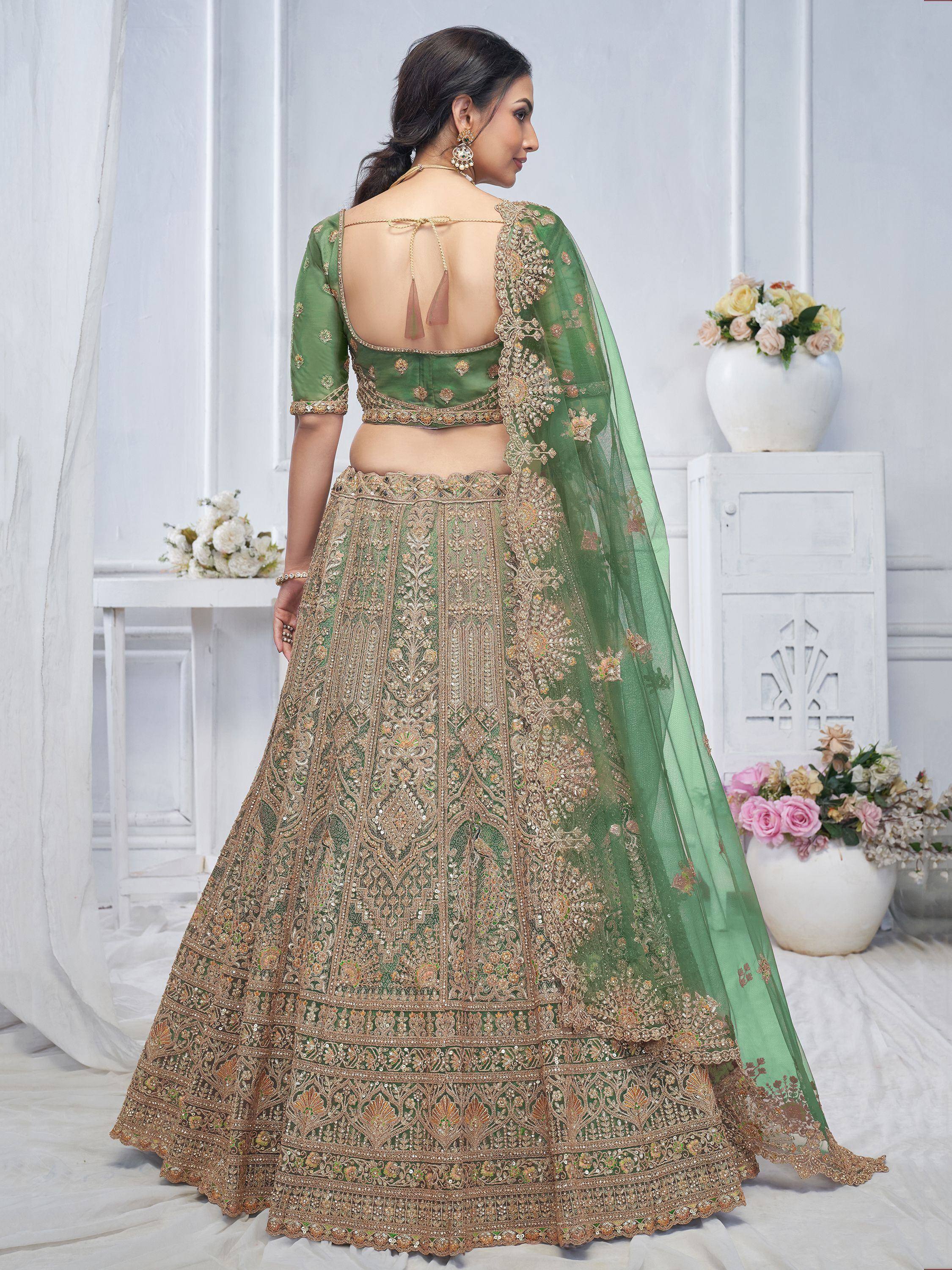 Green embroidered lehenga choli with open back blouse and sheer dupatta, Indian ethnic wear