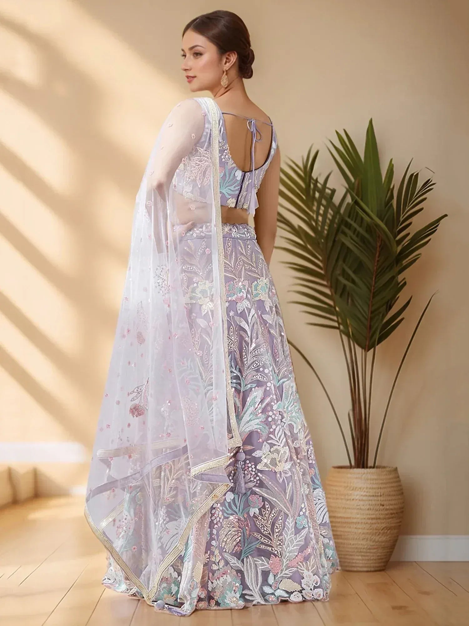 Elegant lavender lehenga choli with floral embroidery and sheer dupatta for Indian ethnic wear
