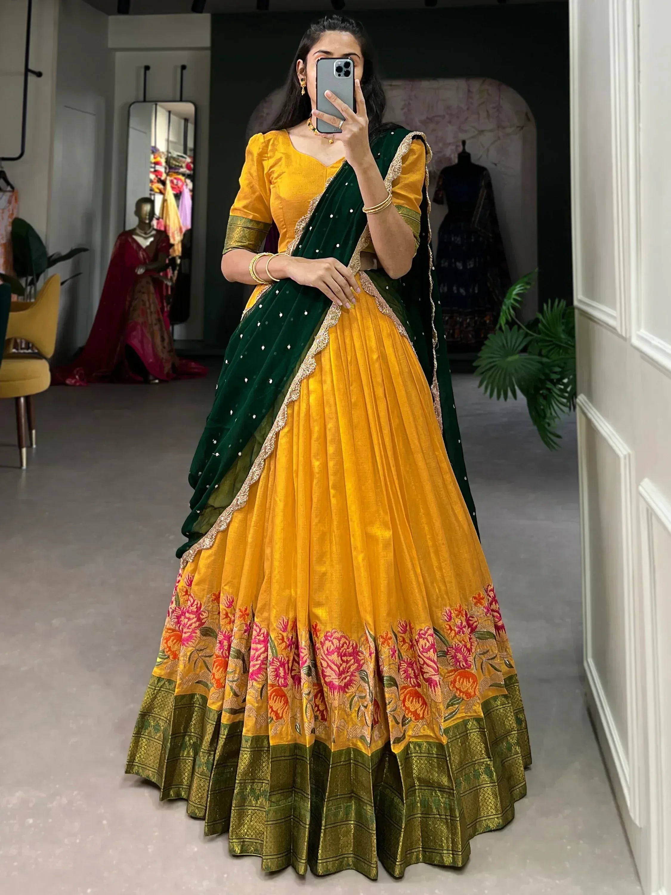 Yellow floral lehenga choli with green velvet dupatta, ethnic Indian wear for weddings and festivals