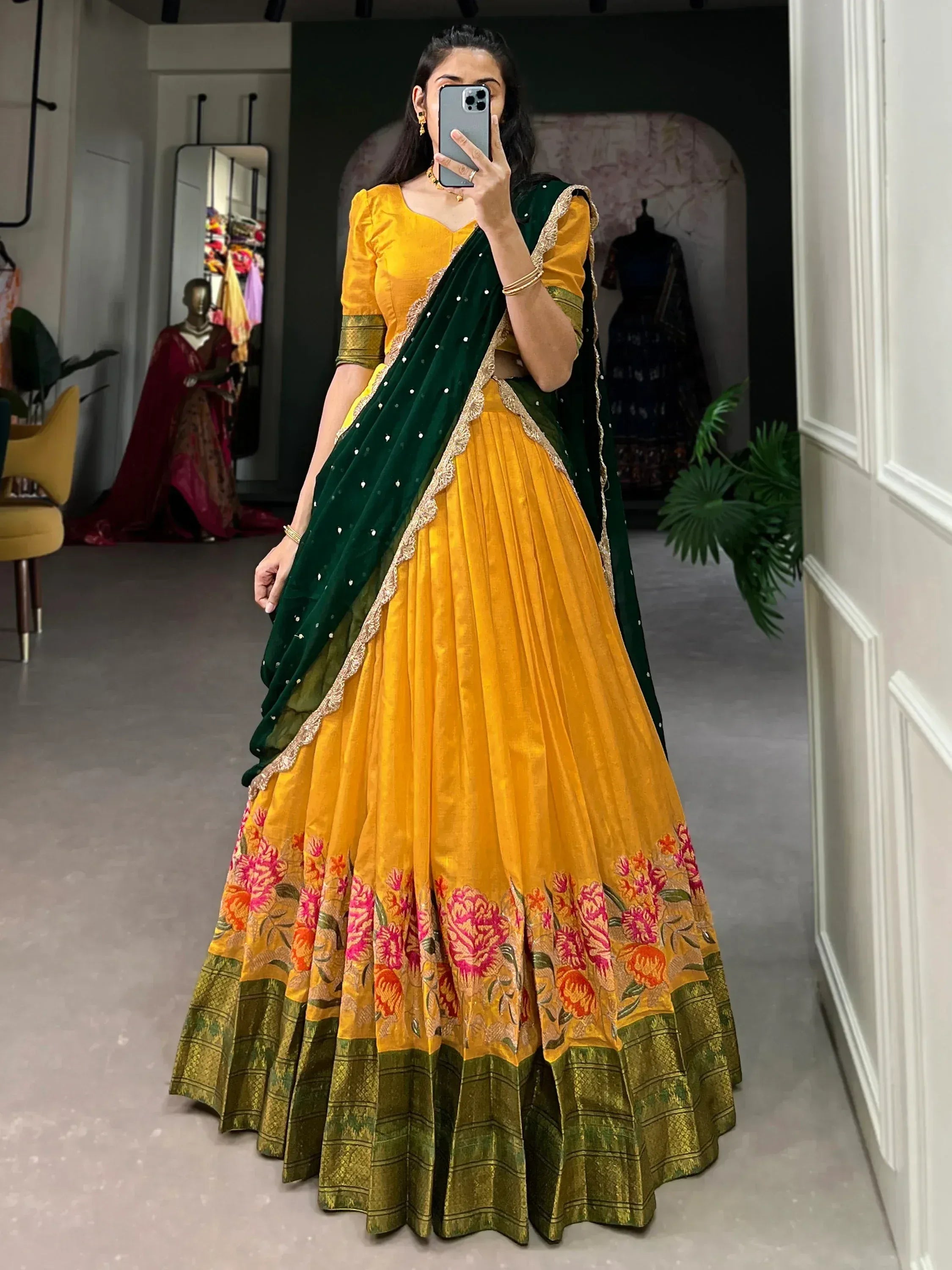 Yellow floral lehenga choli with green velvet dupatta, ethnic Indian wear for weddings and festivals
