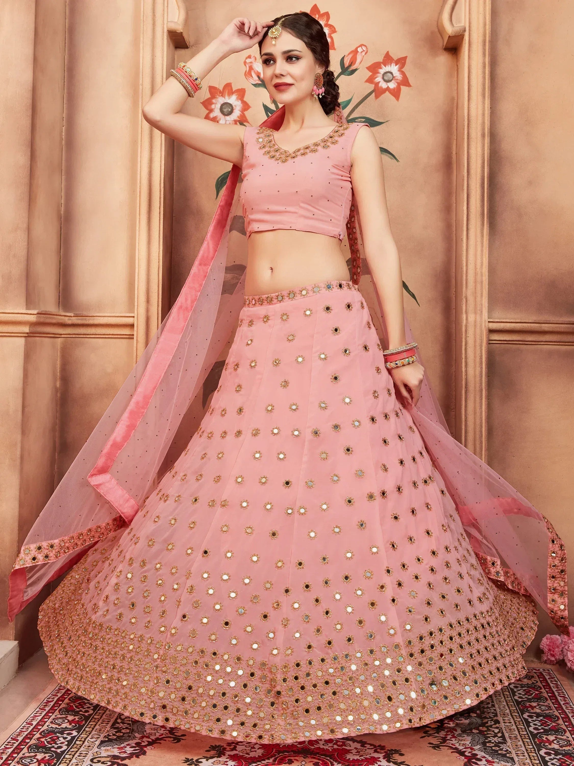 Pink mirror-work lehenga choli with dupatta, ethnic Indian wear for weddings and parties