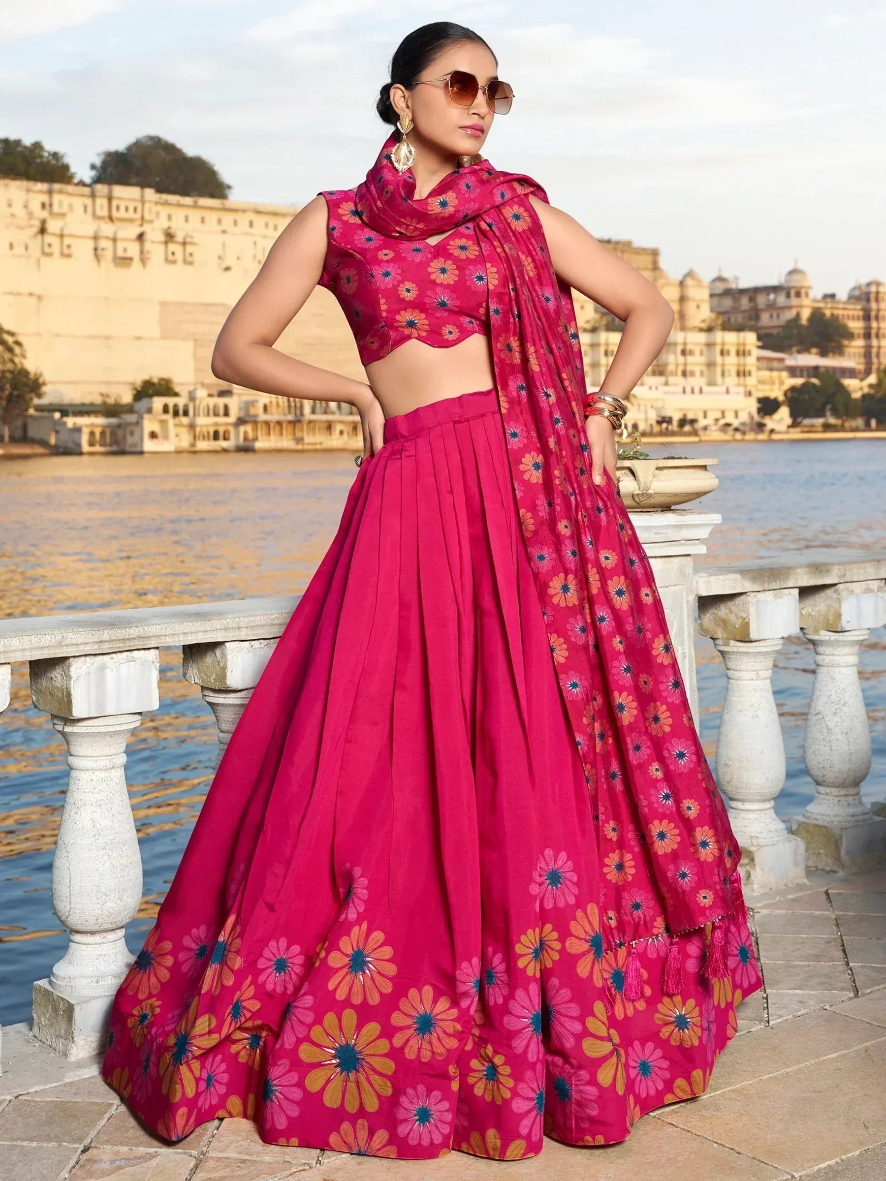 Vibrant pink floral lehenga choli with matching dupatta, perfect for Indian ethnic occasions