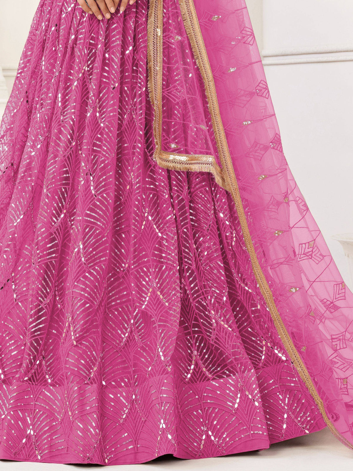 Pink embroidered lehenga with gold trim and sequin detailing, Indian ethnic wear
