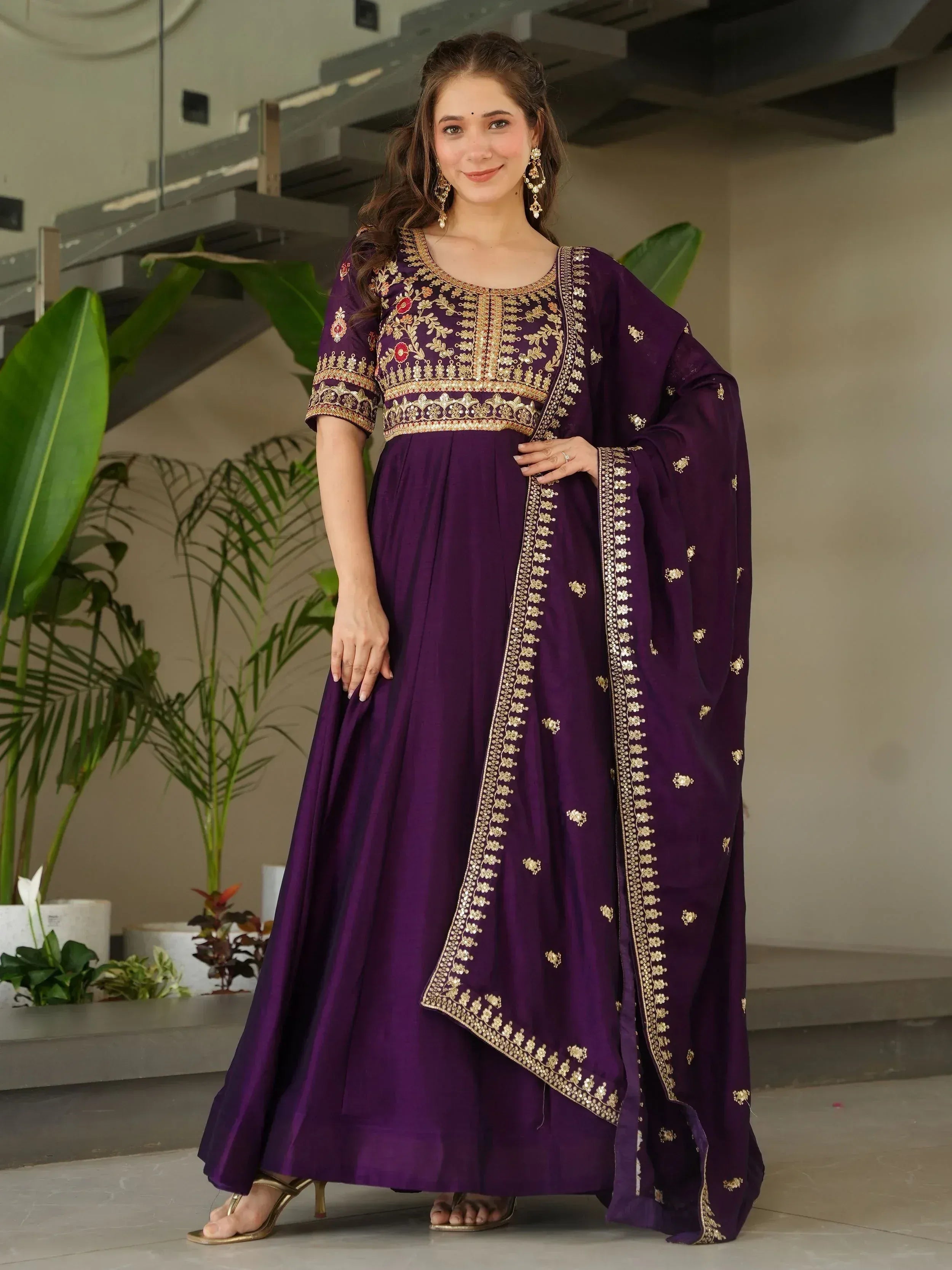 Purple embroidered anarkali suit with gold detailing, perfect for Indian ethnic occasions
