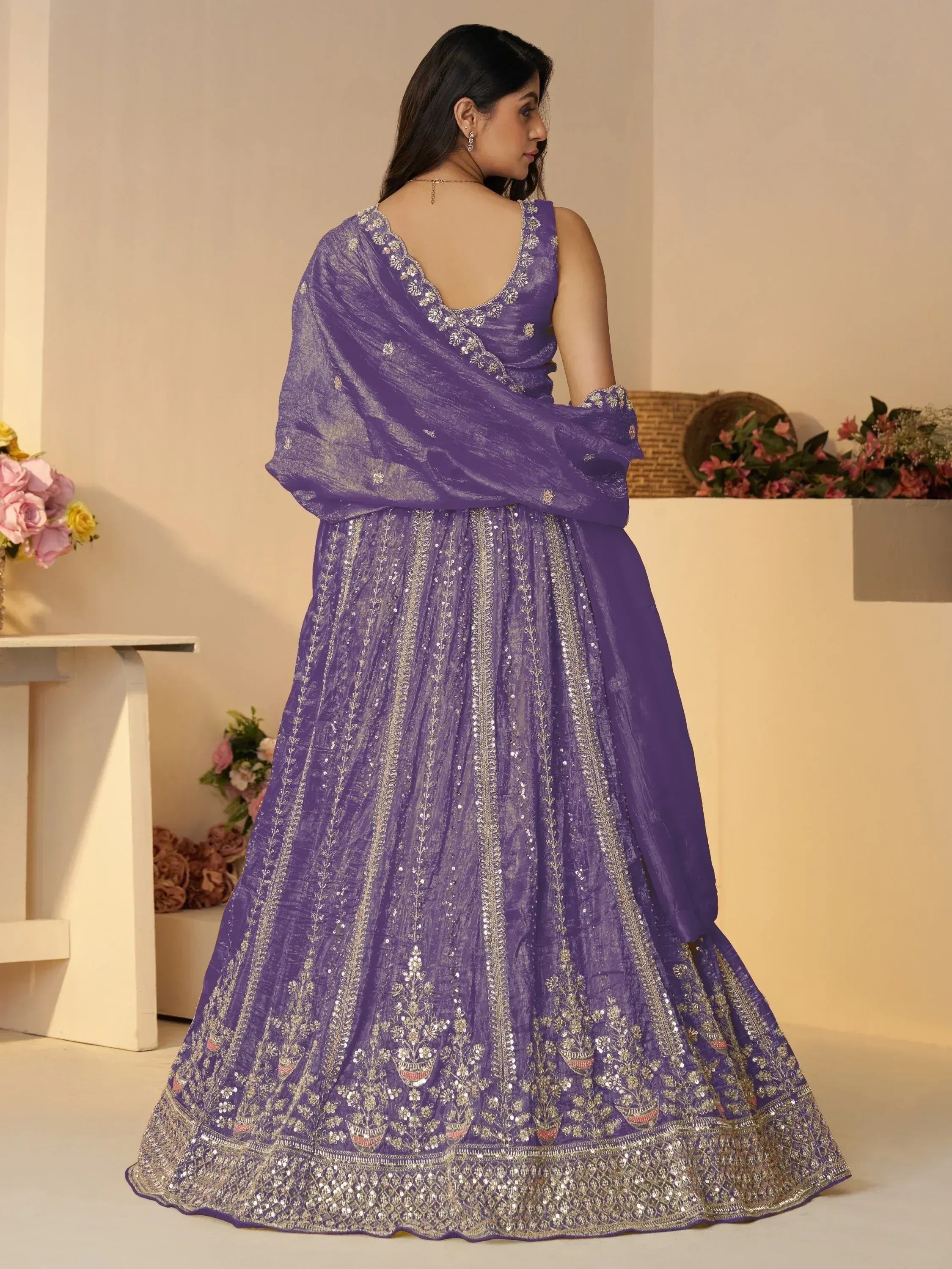 Purple designer lehenga choli with gold embroidery and sequins, ethnic Indian wear for women