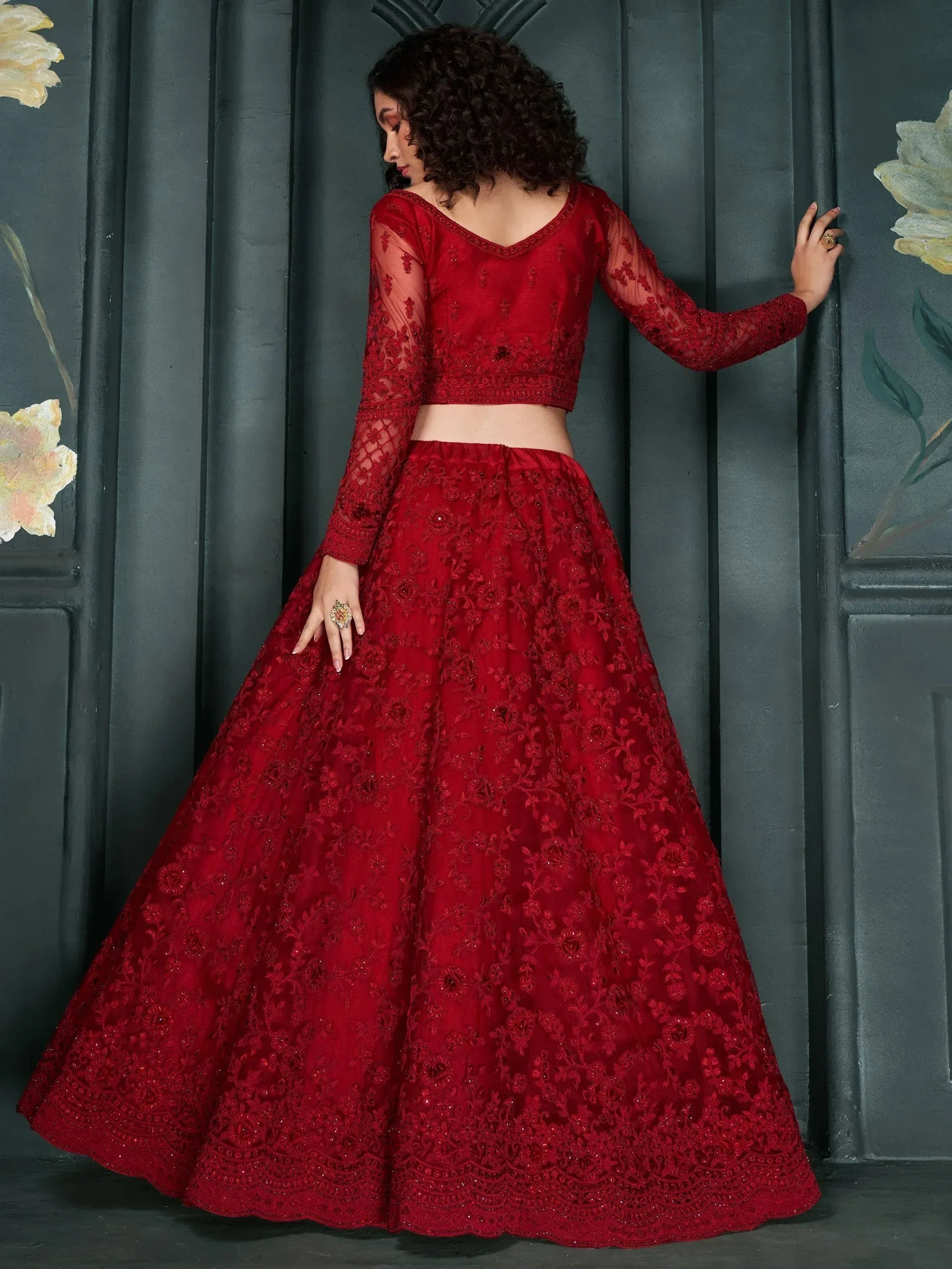 Red embroidered lehenga choli with sheer sleeves, Indian ethnic wear for weddings and festivals