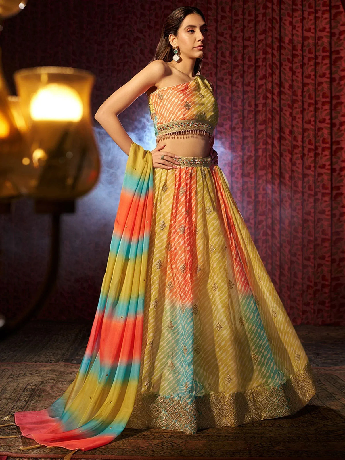 Vibrant multicolor lehenga choli with tie-dye dupatta, perfect for Indian ethnic wear occasions.
