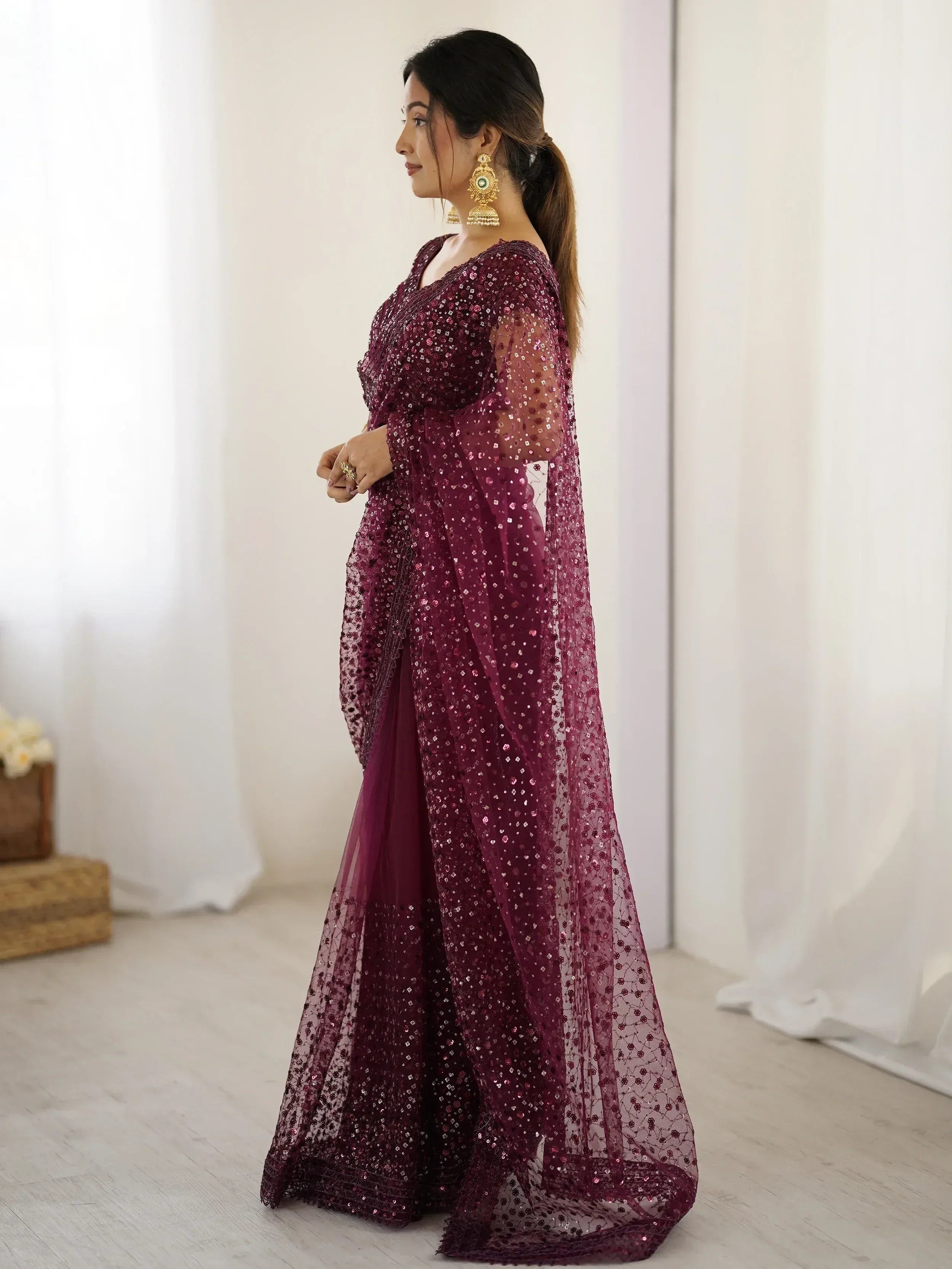 Burgundy sequin saree with sheer overlay, perfect for Indian ethnic wear events