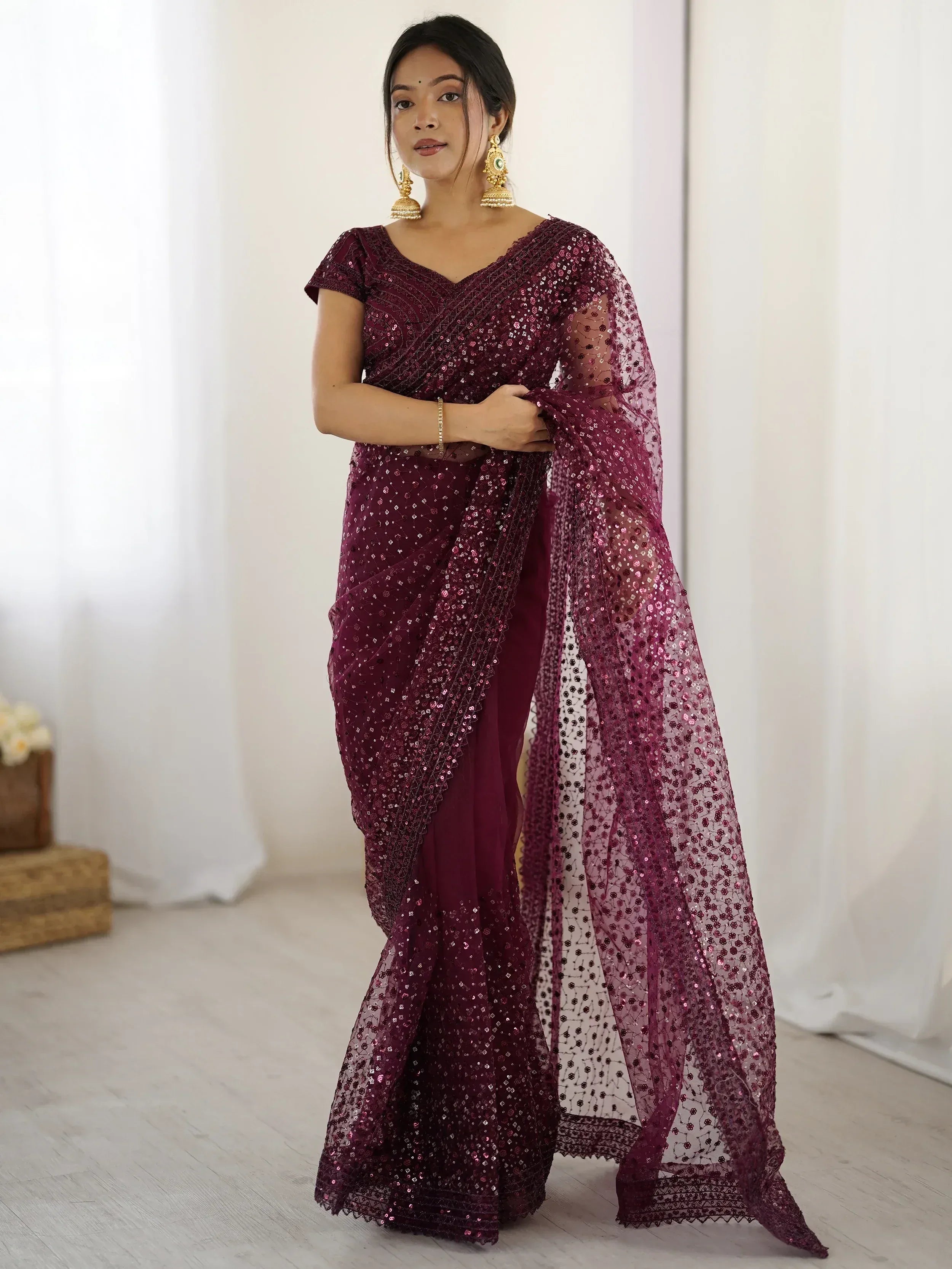 Burgundy sequin saree with sheer overlay, perfect for Indian ethnic wear events
