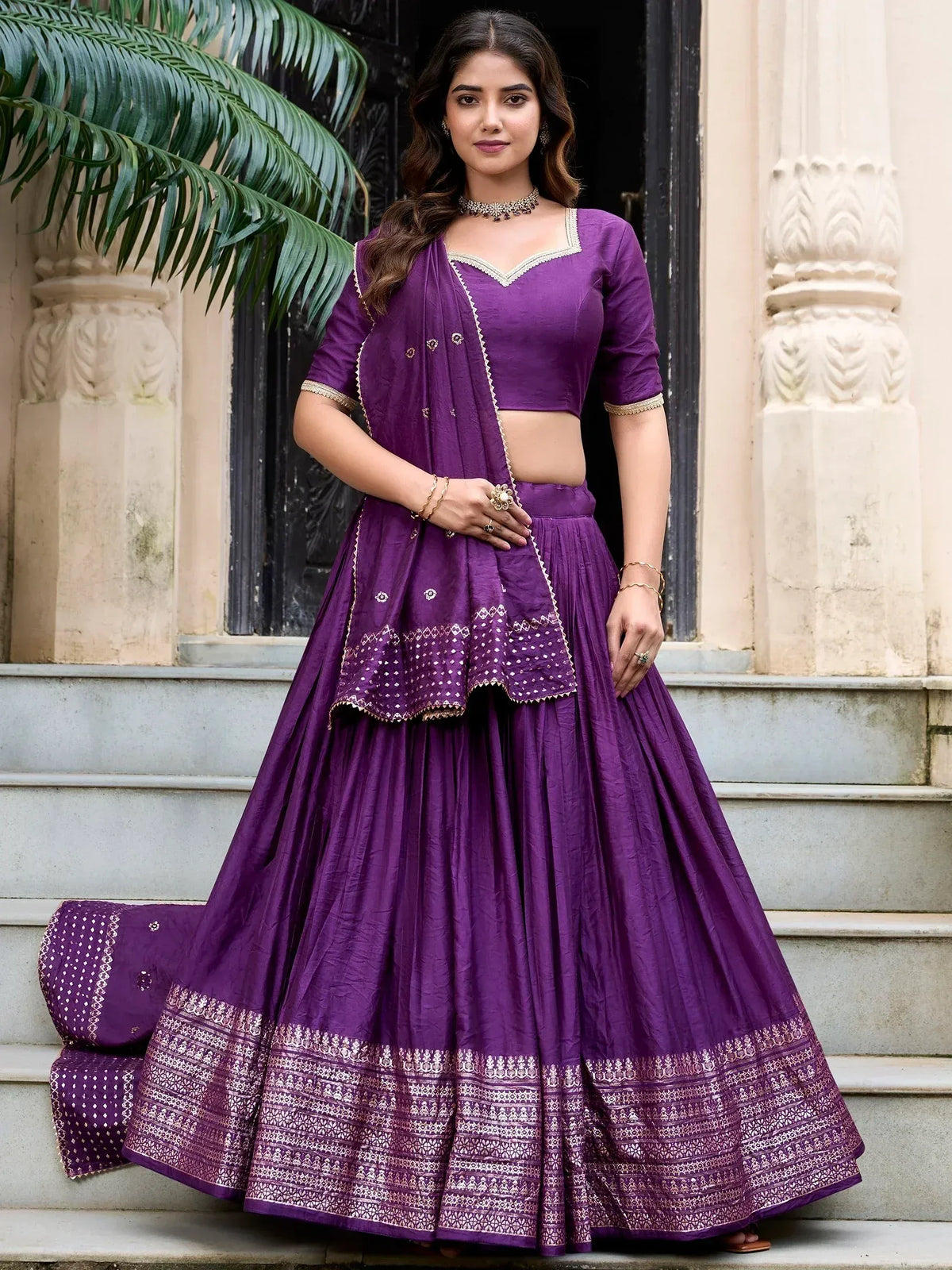 Purple designer lehenga choli with gold embroidery, perfect for Indian ethnic wear occasions