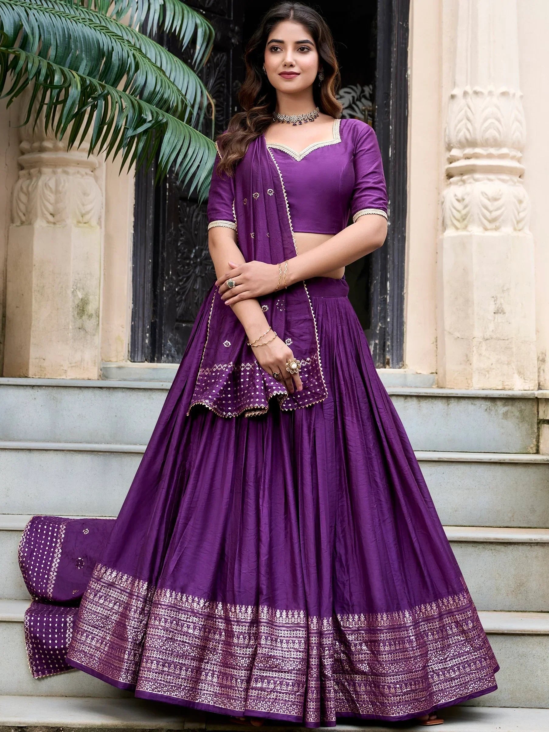 Purple designer lehenga choli with gold embroidery, perfect for Indian ethnic wear occasions