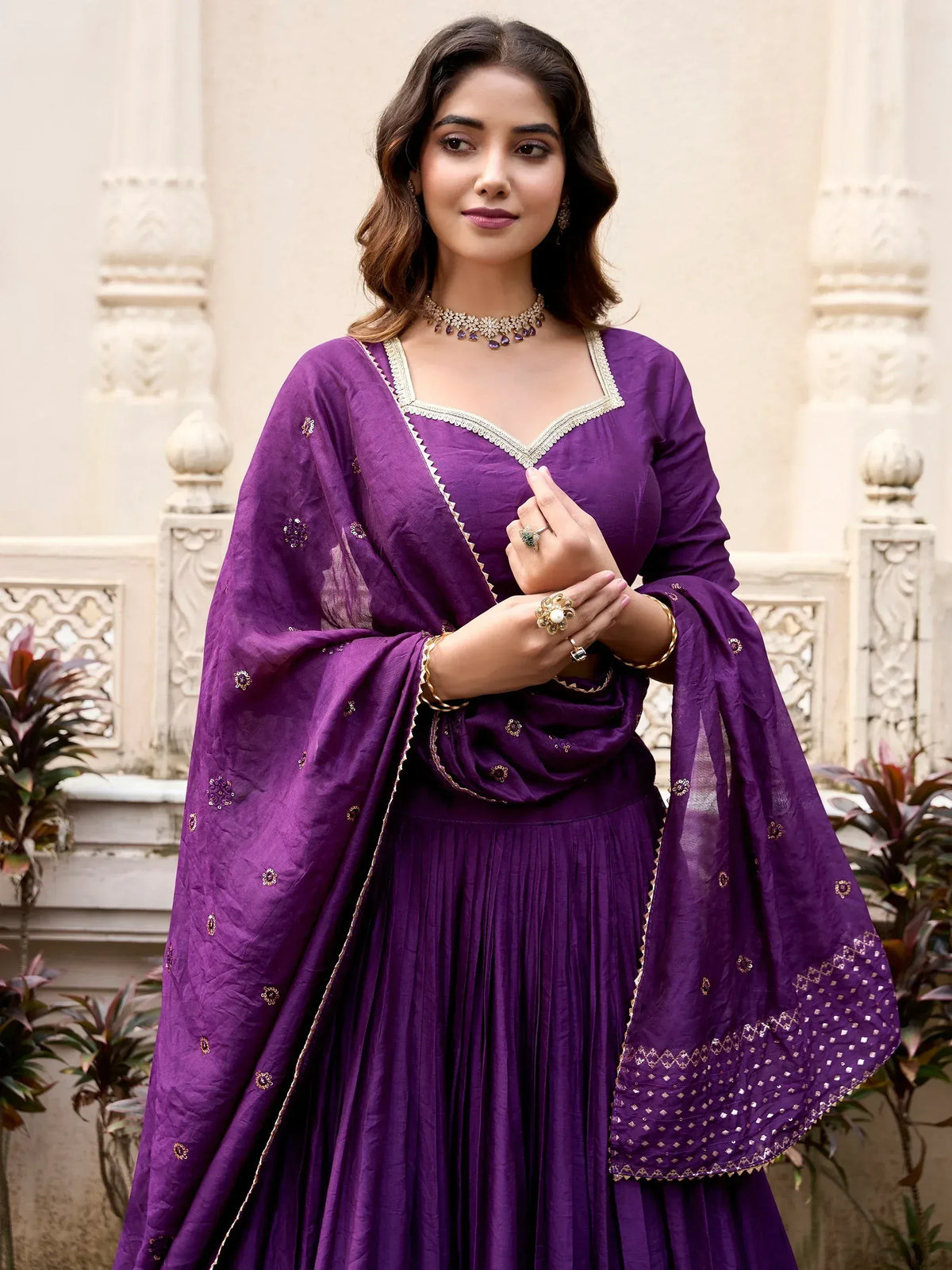 Purple designer salwar kameez with gold embroidery, perfect for Indian ethnic wear occasions