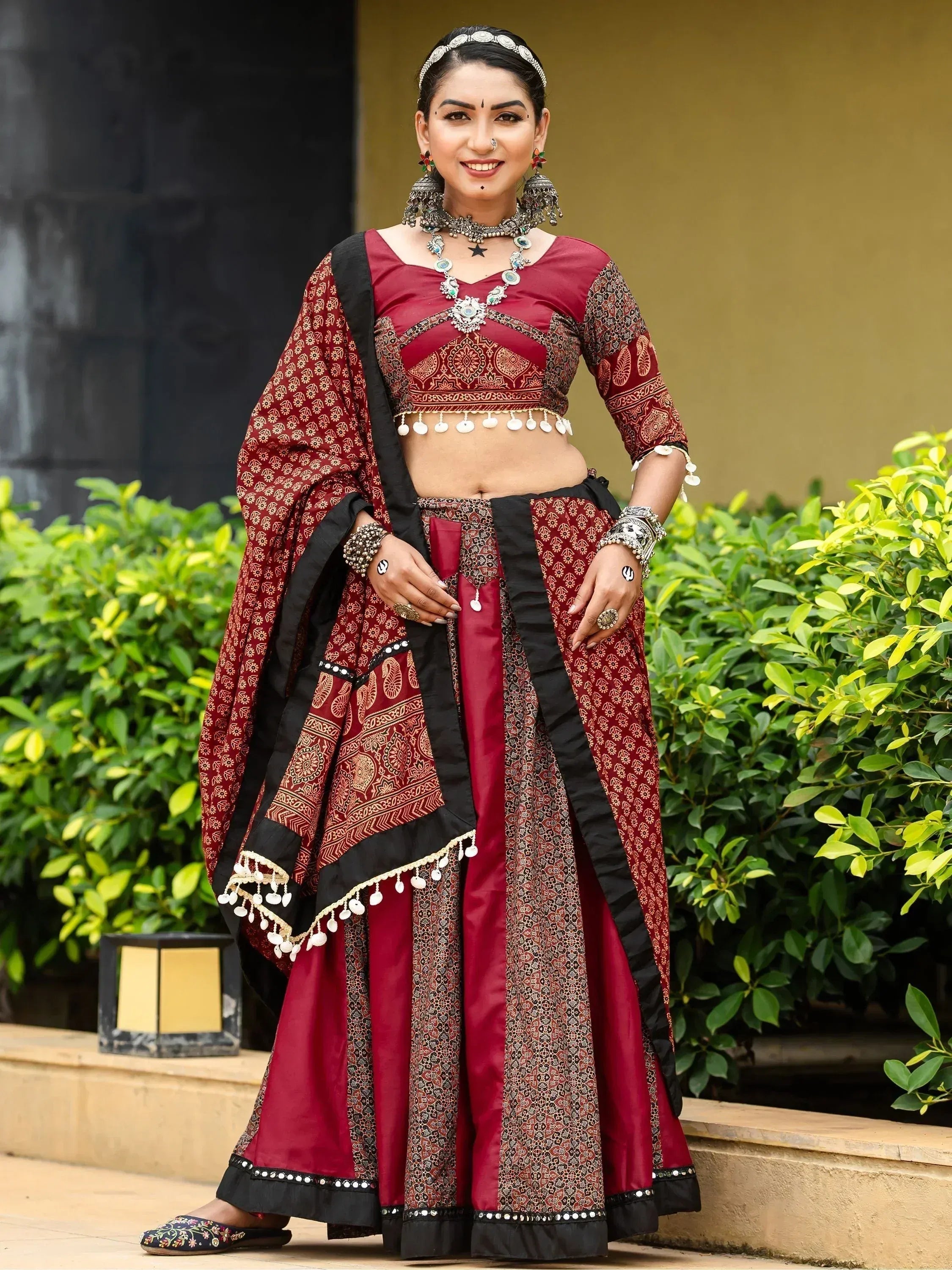 Maroon and black printed lehenga choli with mirror work, traditional Indian ethnic wear for women