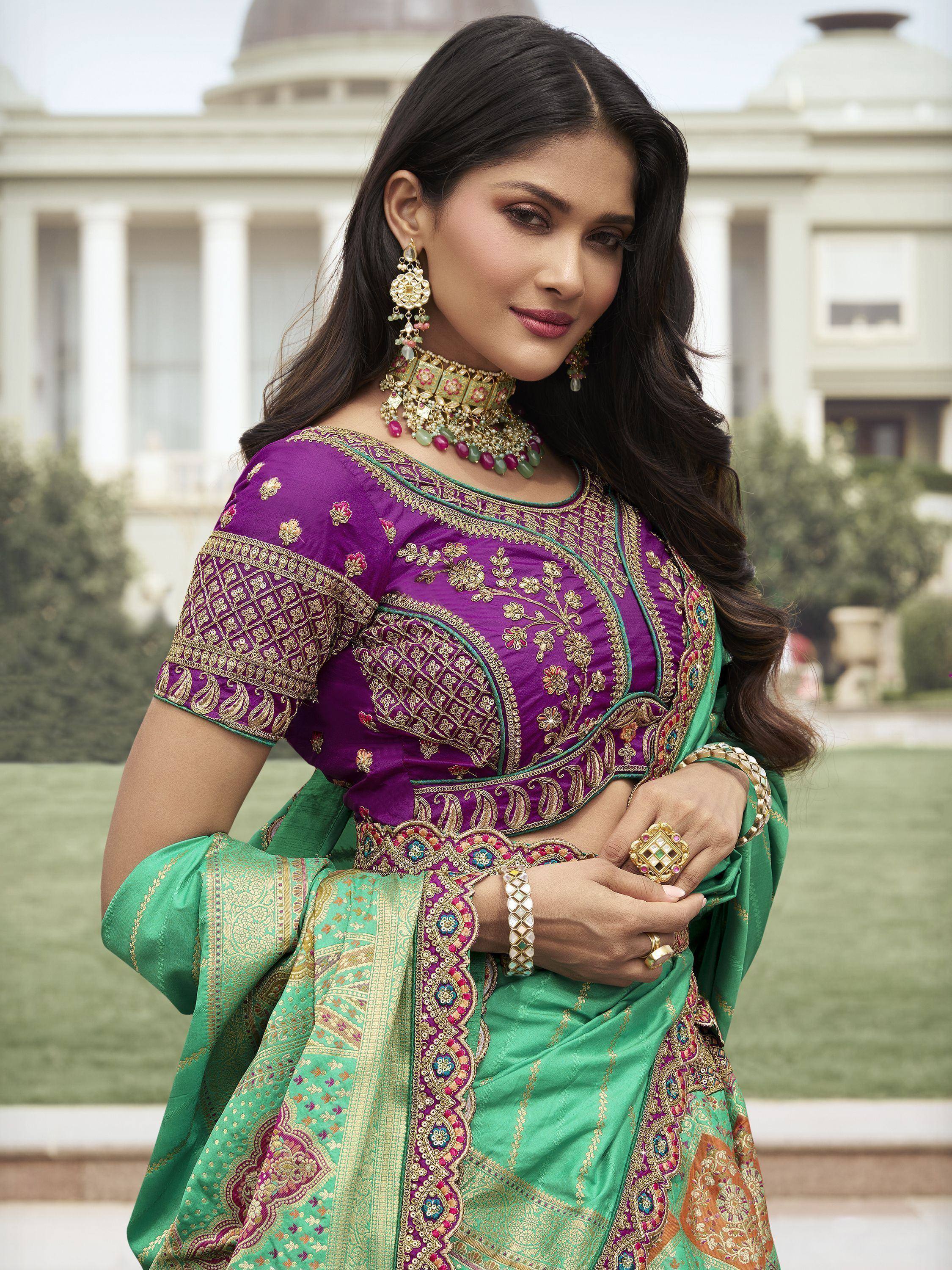Purple and green designer saree with gold embroidery, perfect for Indian ethnic wear occasions