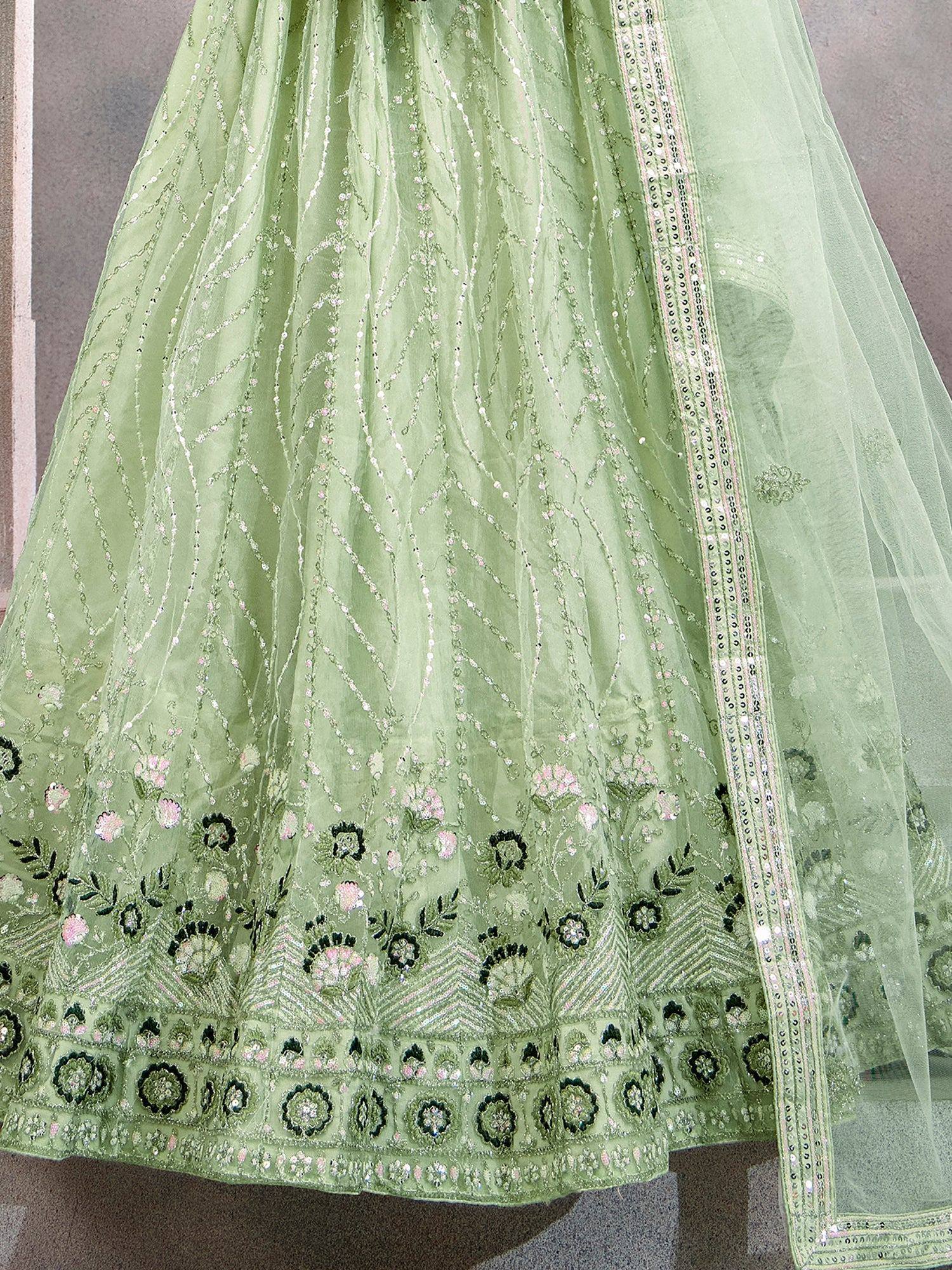 Light green embroidered lehenga with floral motifs and sequin detailing, perfect for Indian ethnic wear.
