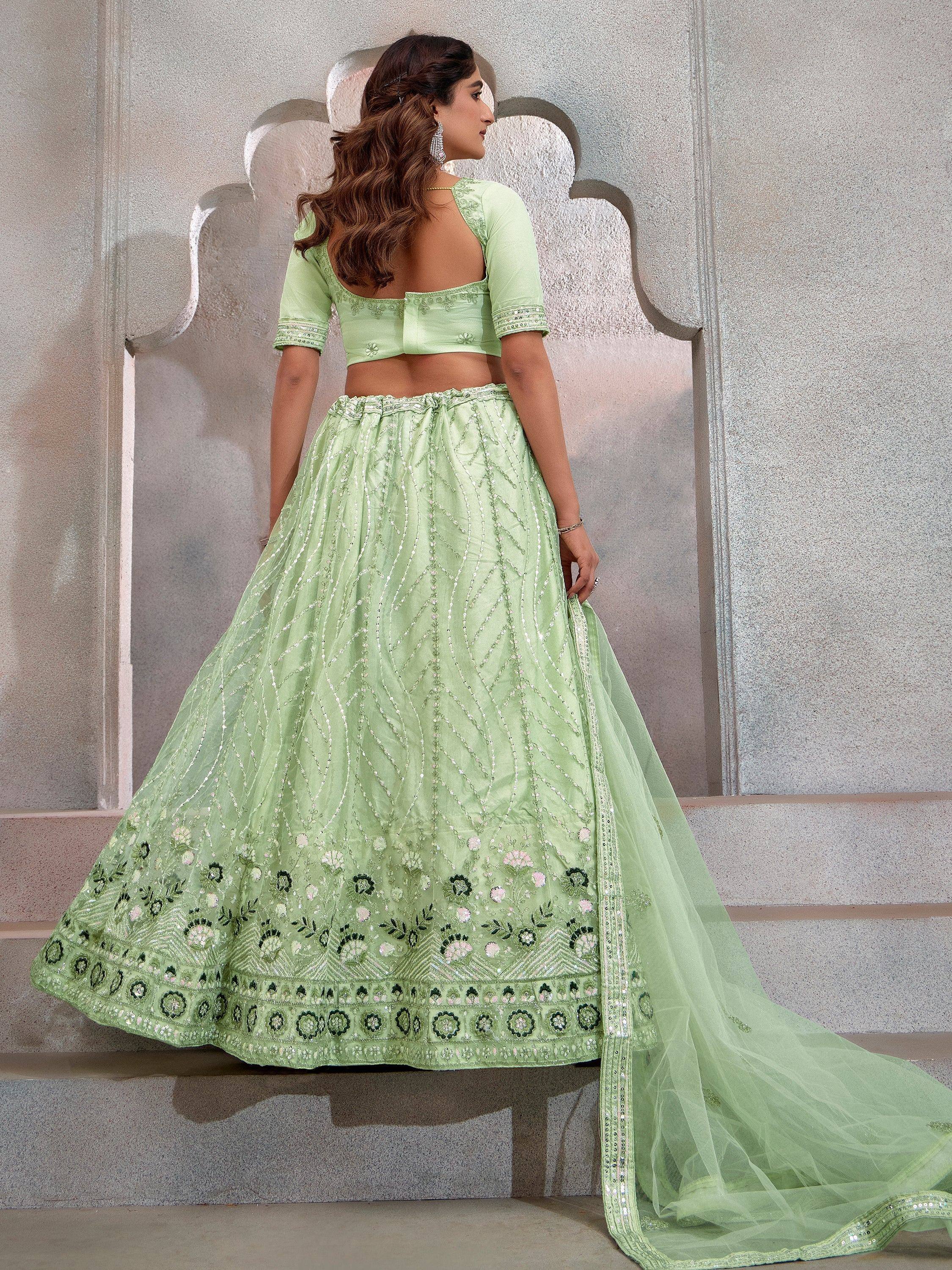 Mint green designer lehenga choli with floral embroidery and sequin work, perfect for Indian ethnic occasions