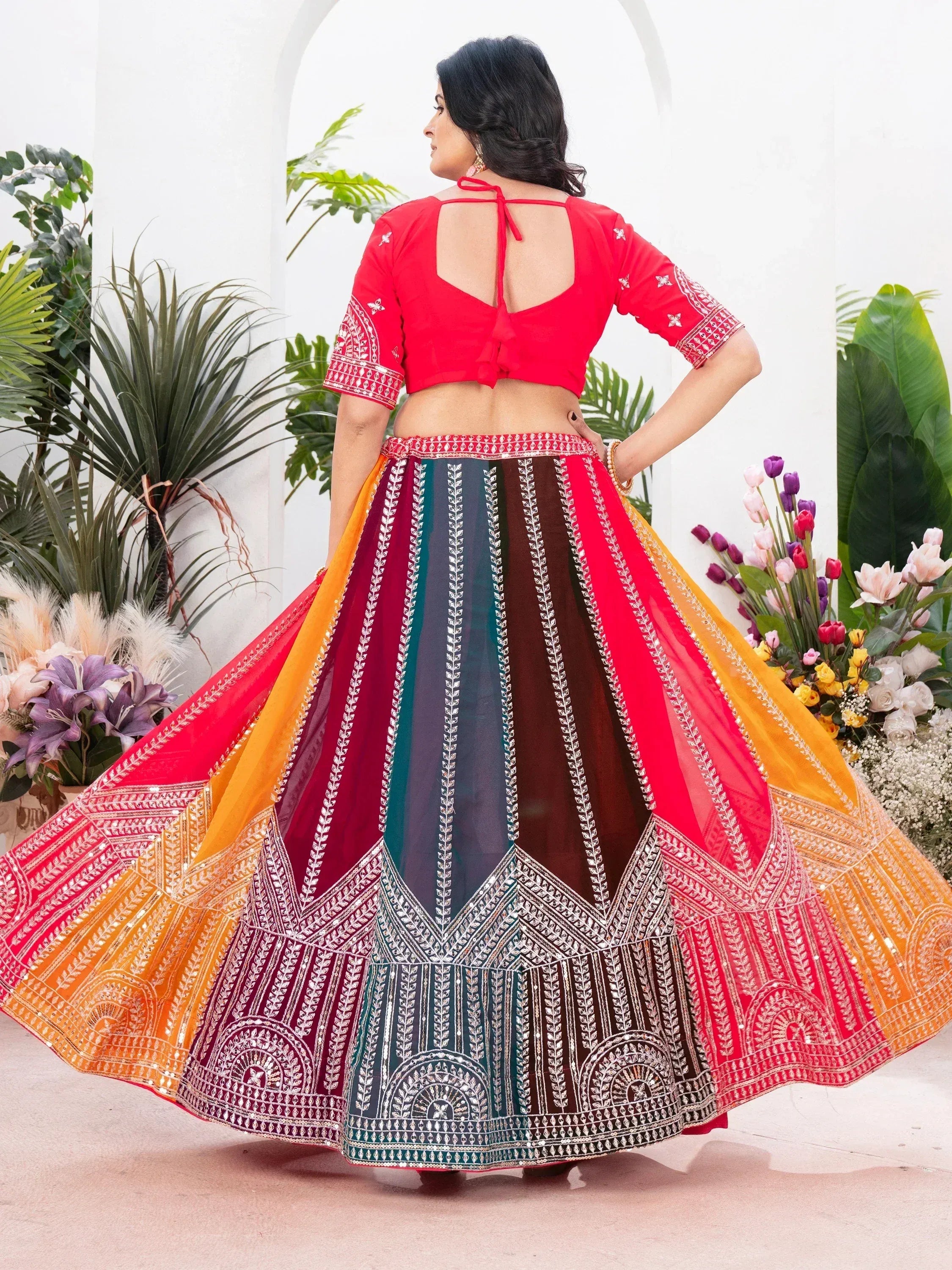 Vibrant multicolor lehenga choli with mirror work, perfect for Indian ethnic wear and festive occasions.