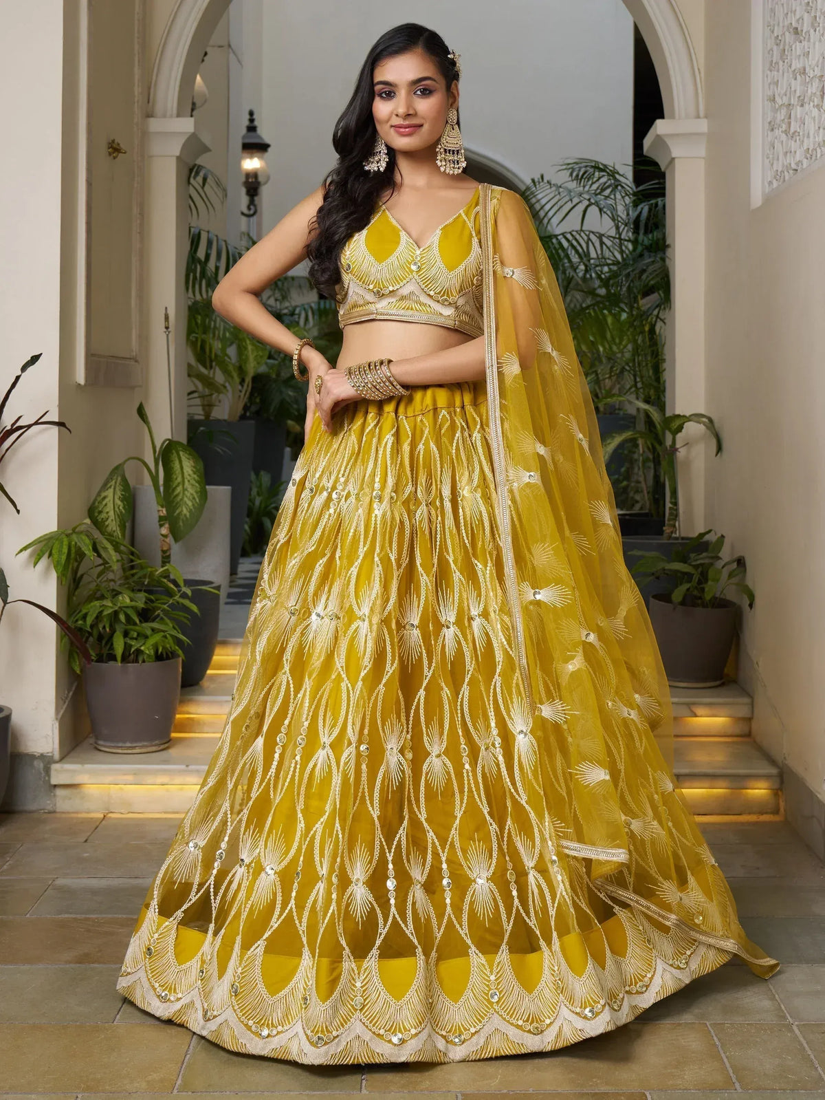 Yellow embroidered lehenga choli with dupatta, Indian ethnic wear for weddings and festivals