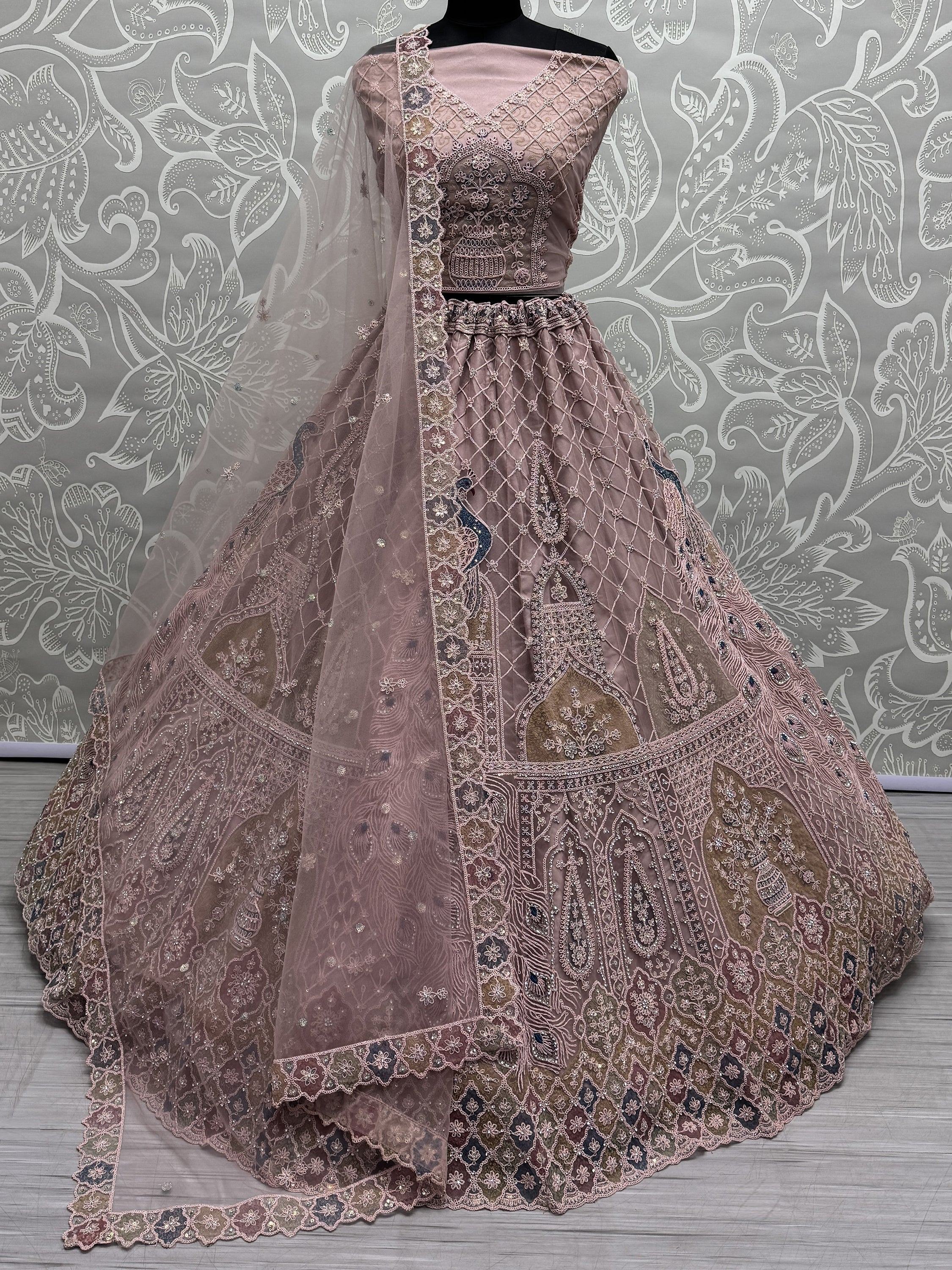 Dusty pink designer lehenga choli with peacock embroidery and net dupatta, ethnic Indian wear