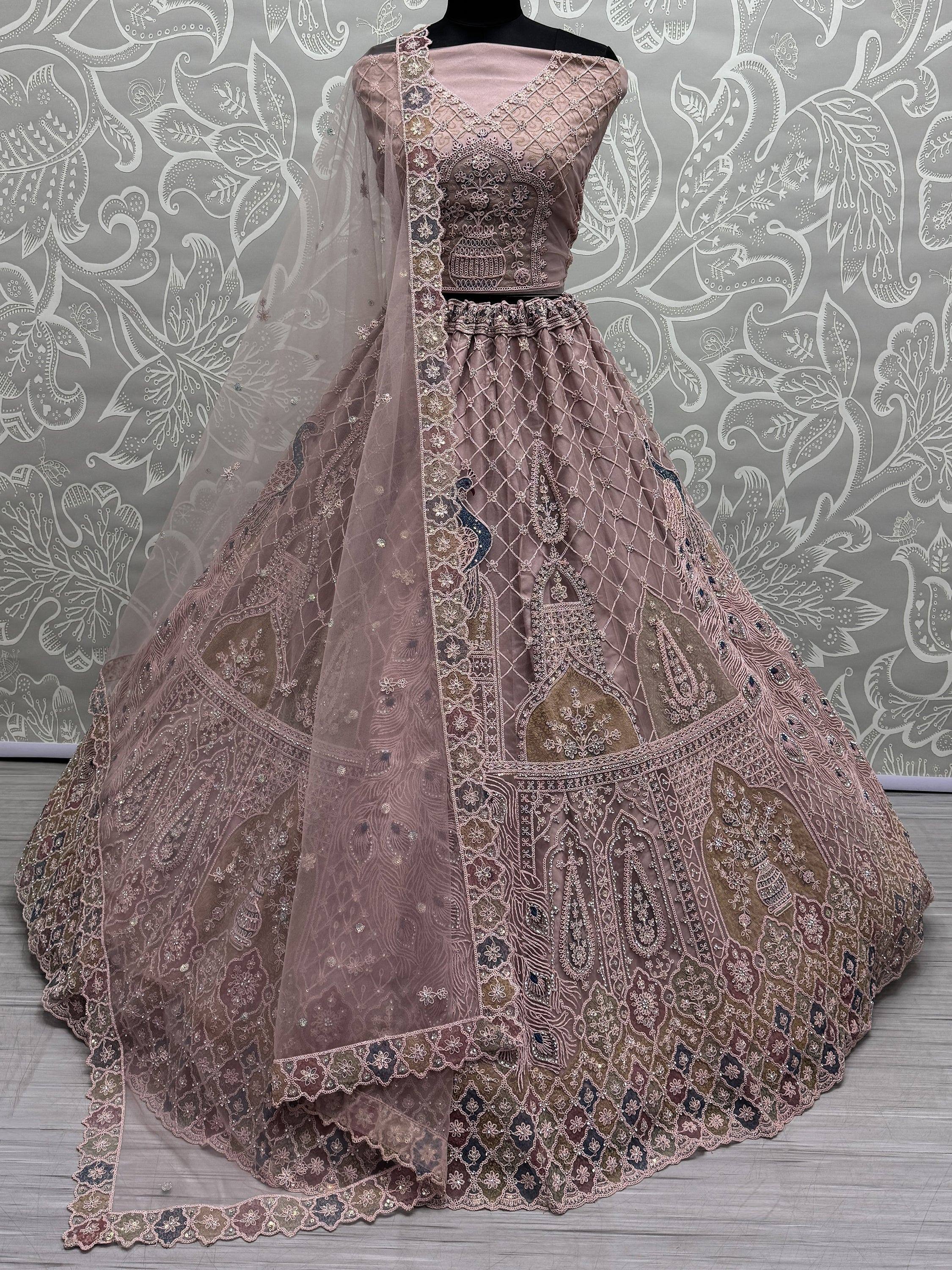 Dusty pink designer lehenga choli with peacock embroidery and net dupatta, ethnic Indian wear