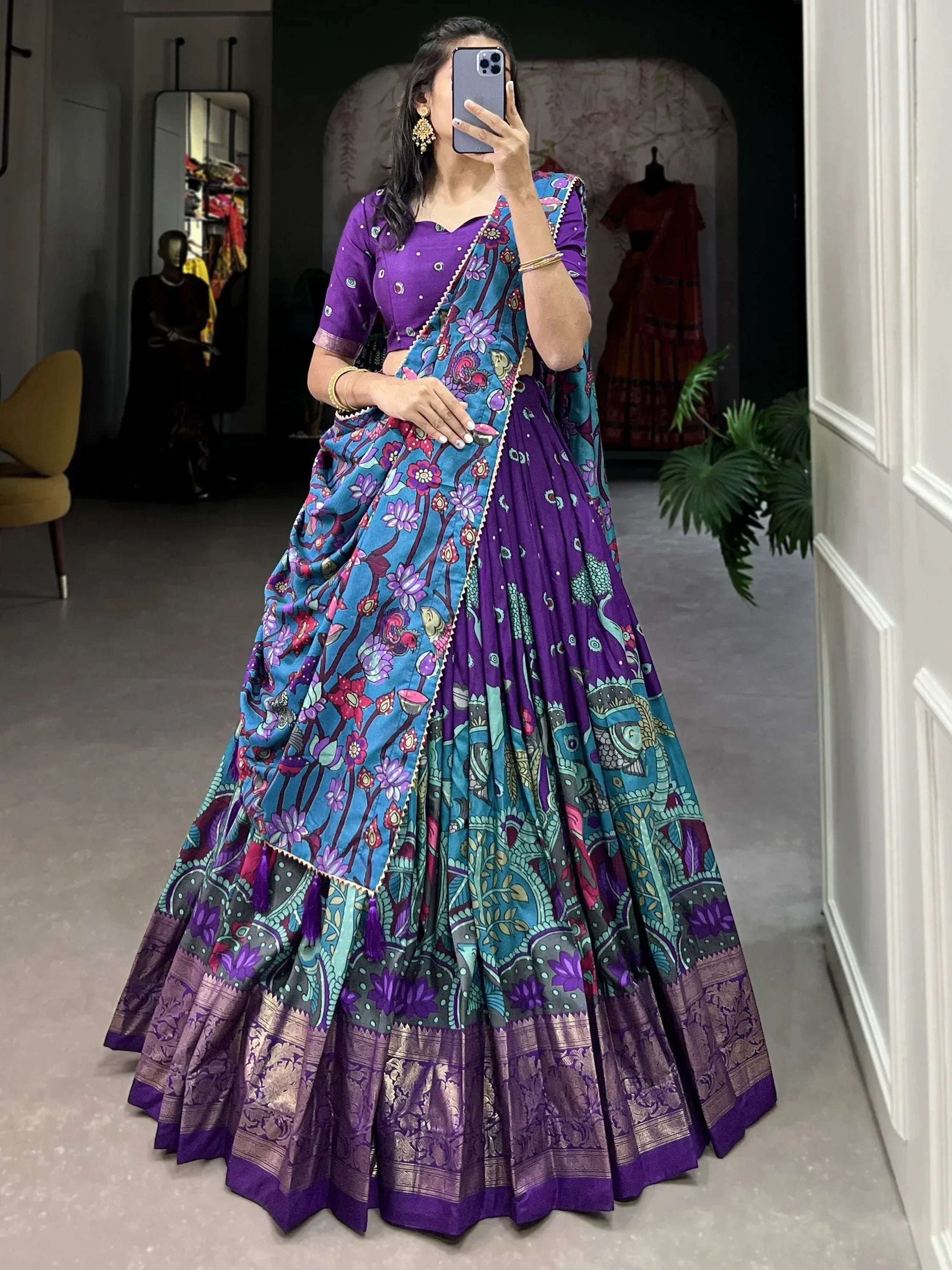 Purple and blue floral print lehenga choli with intricate border, perfect for Indian ethnic wear occasions