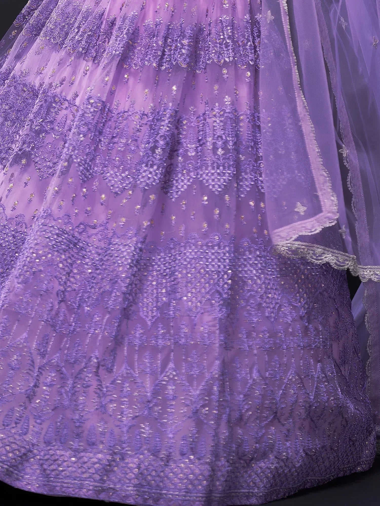 Lavender designer lehenga with intricate embroidery and sequin work, perfect for Indian ethnic occasions
