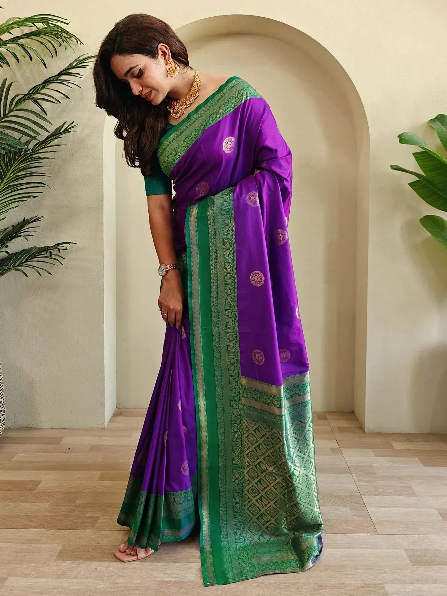 Purple and green designer saree with gold zari border, perfect for Indian ethnic occasions