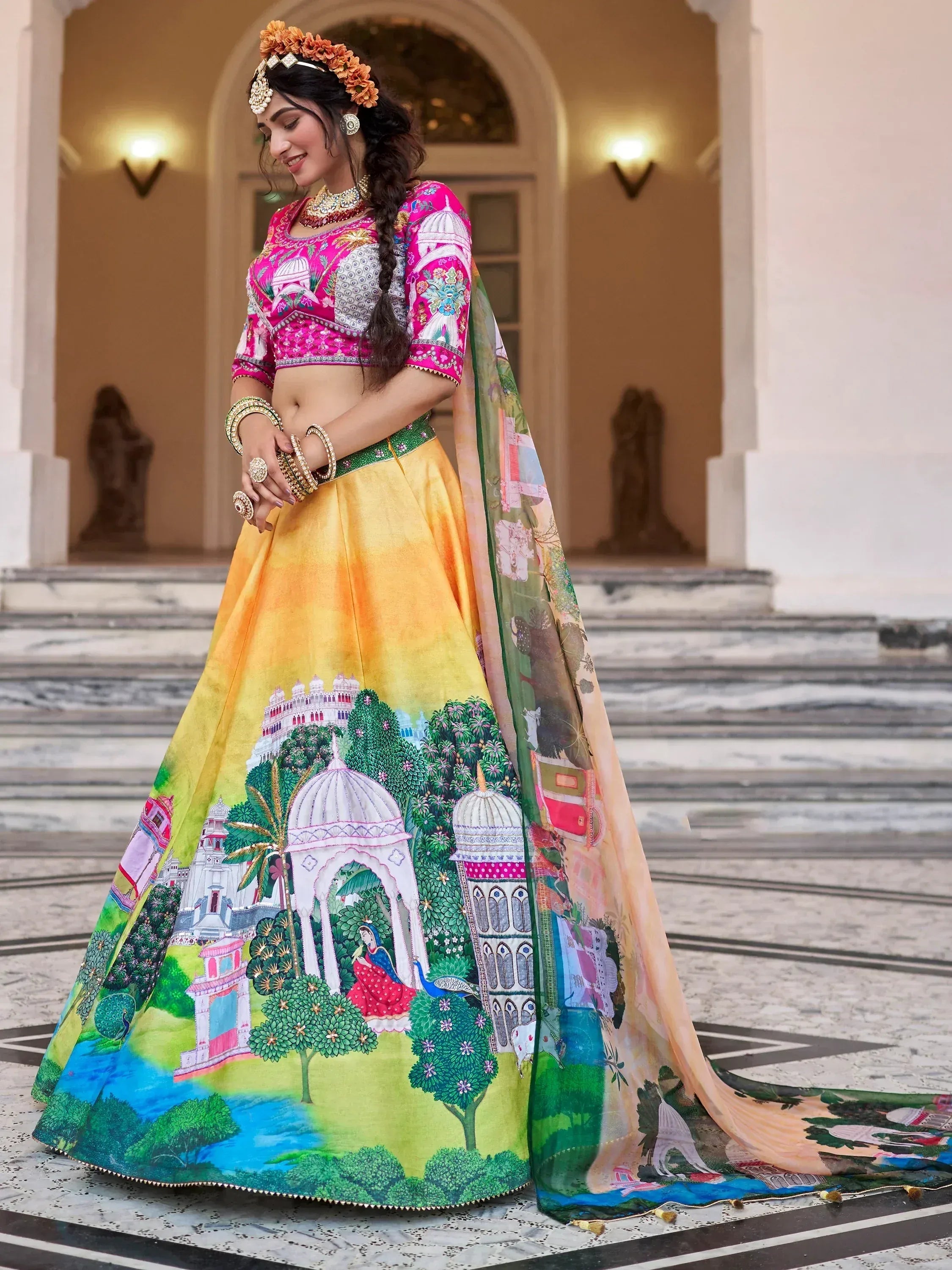 Vibrant pink and yellow lehenga choli with palace print, perfect for Indian ethnic wear events.