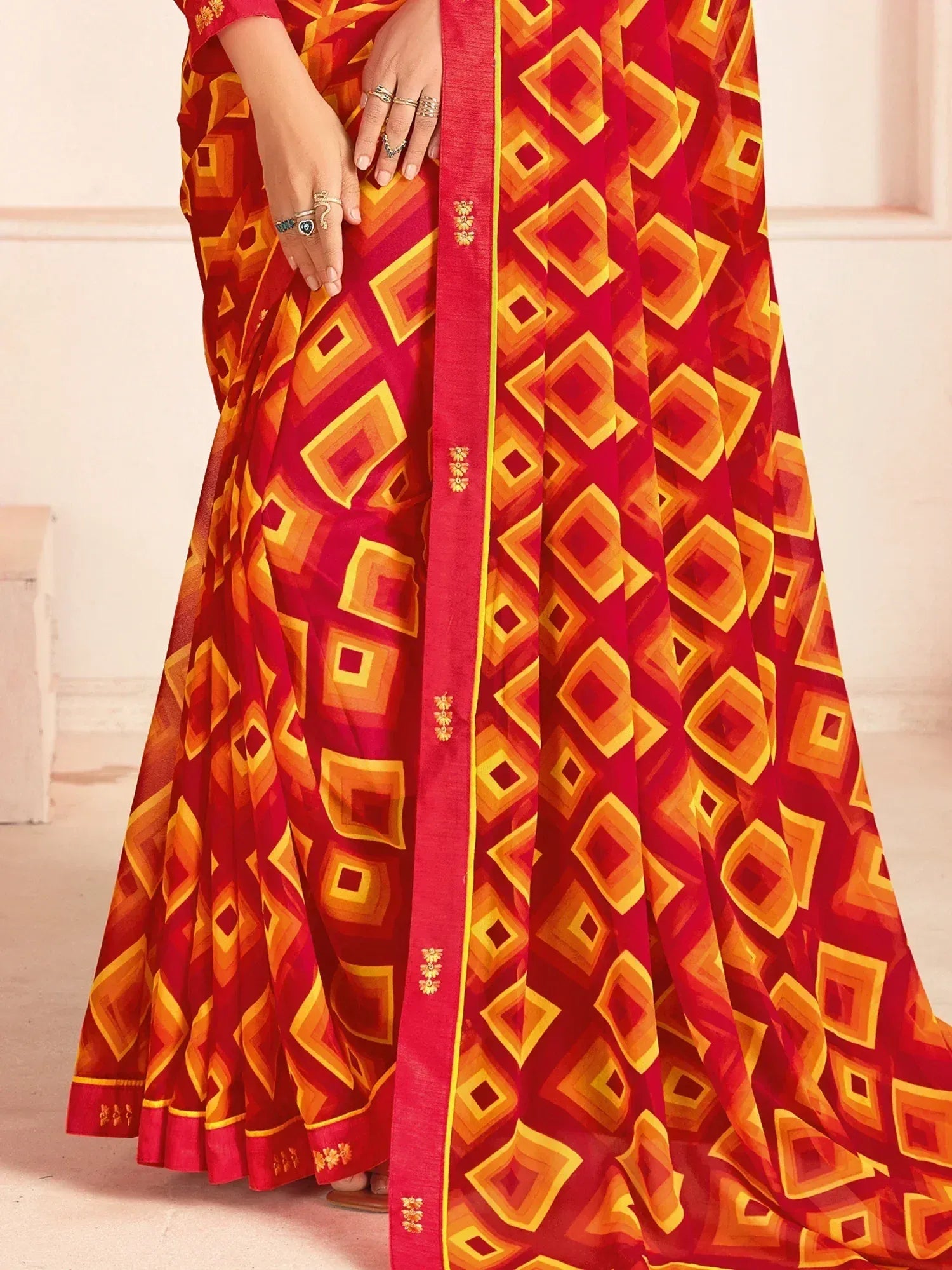 Red and orange geometric print saree with gold border, Indian ethnic wear
