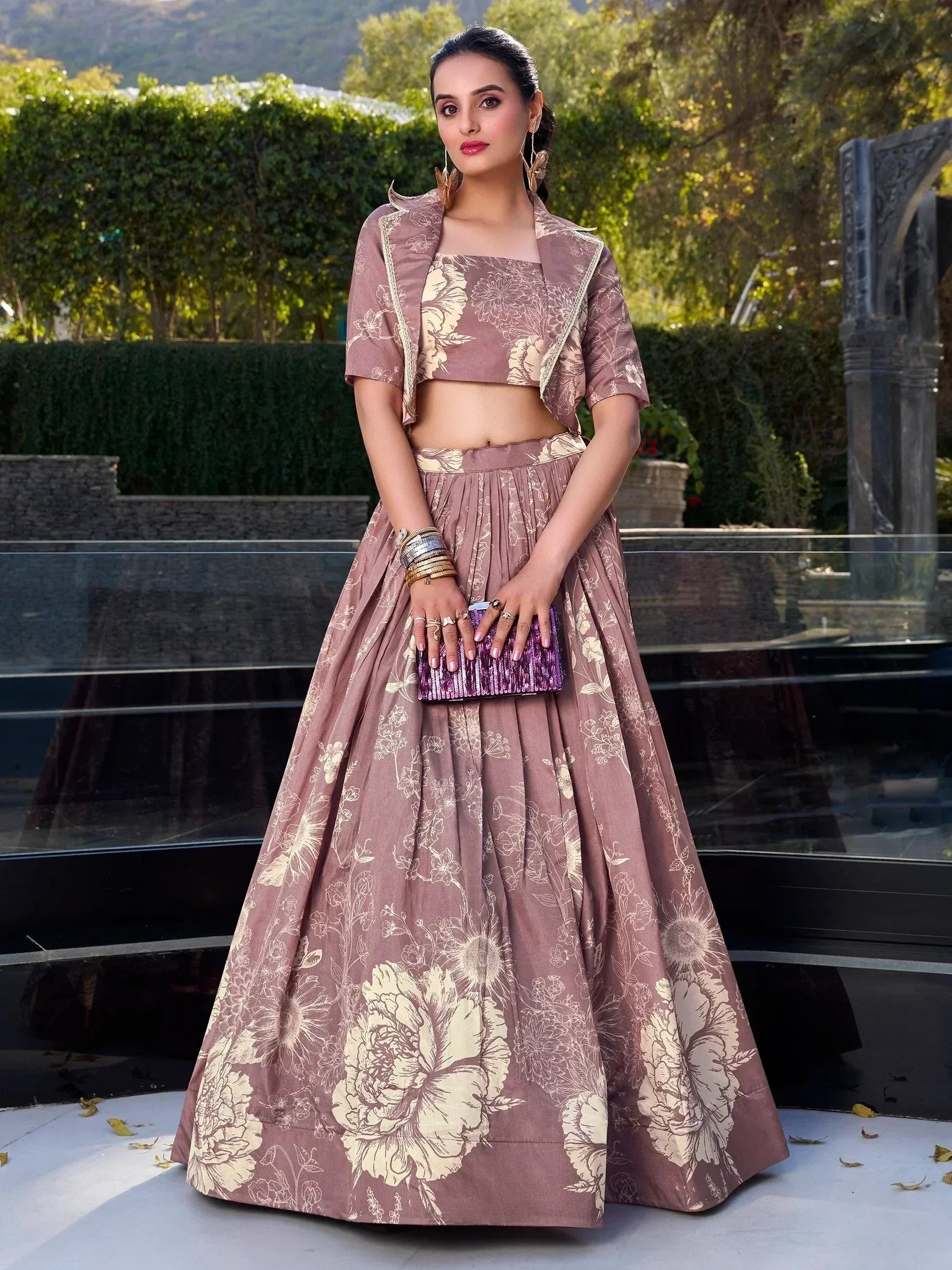 Elegant mauve floral lehenga choli with matching jacket, perfect for Indian ethnic wear occasions.