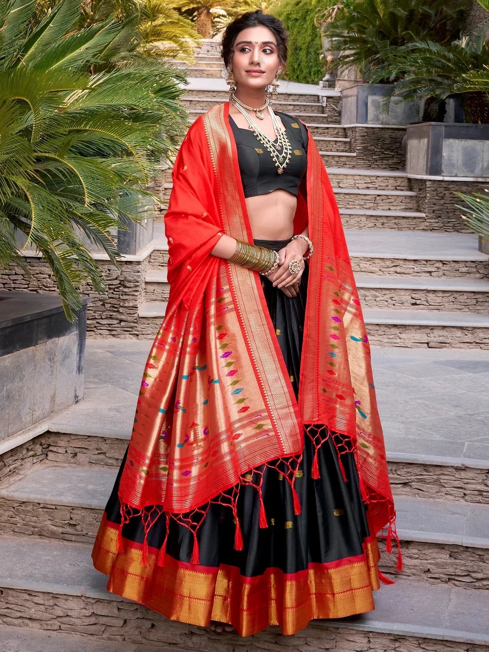 Black and red designer lehenga choli with embroidered dupatta, perfect for Indian ethnic occasions