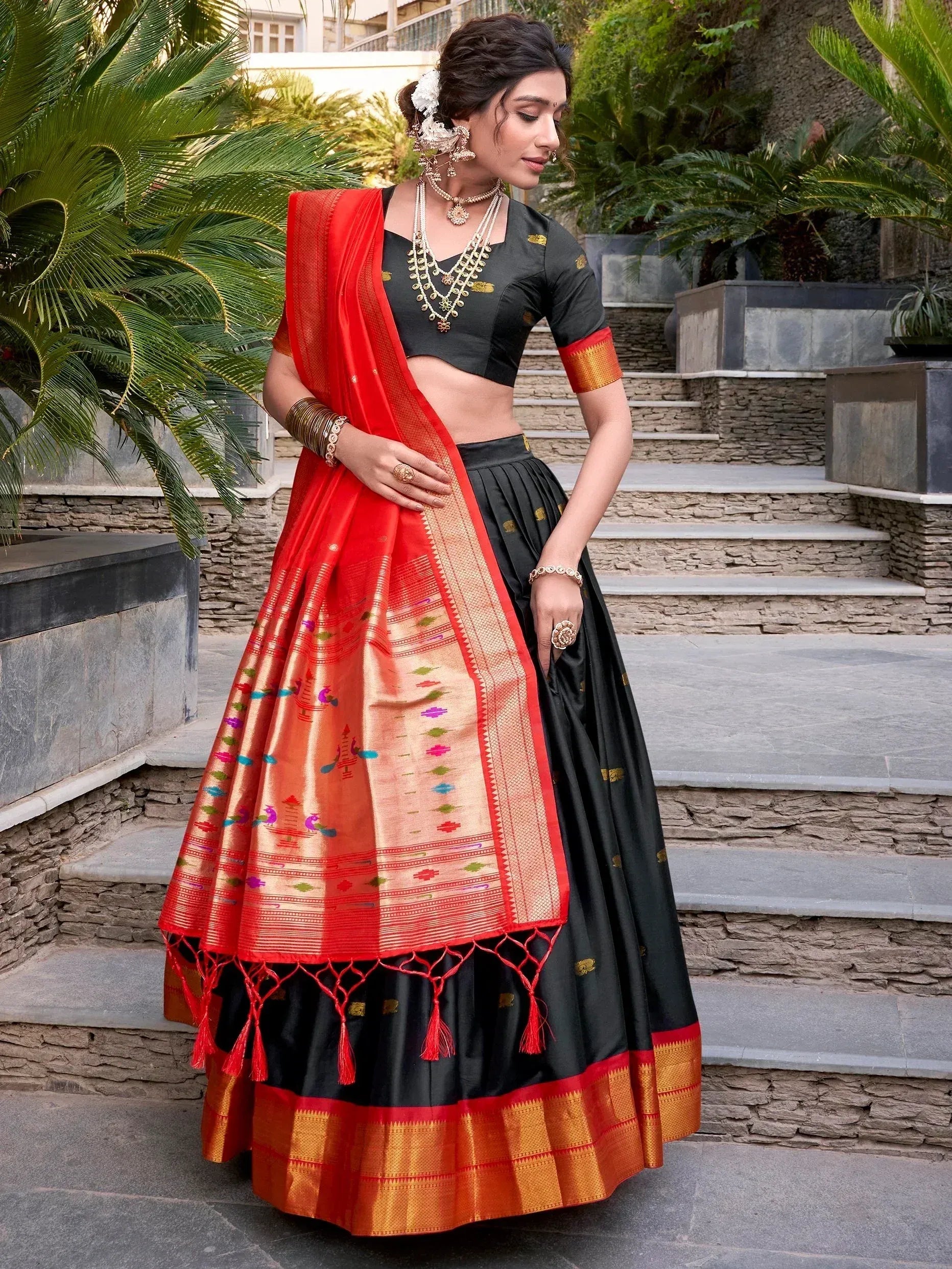 Black and red designer lehenga choli with embroidered dupatta, perfect for Indian ethnic wear occasions