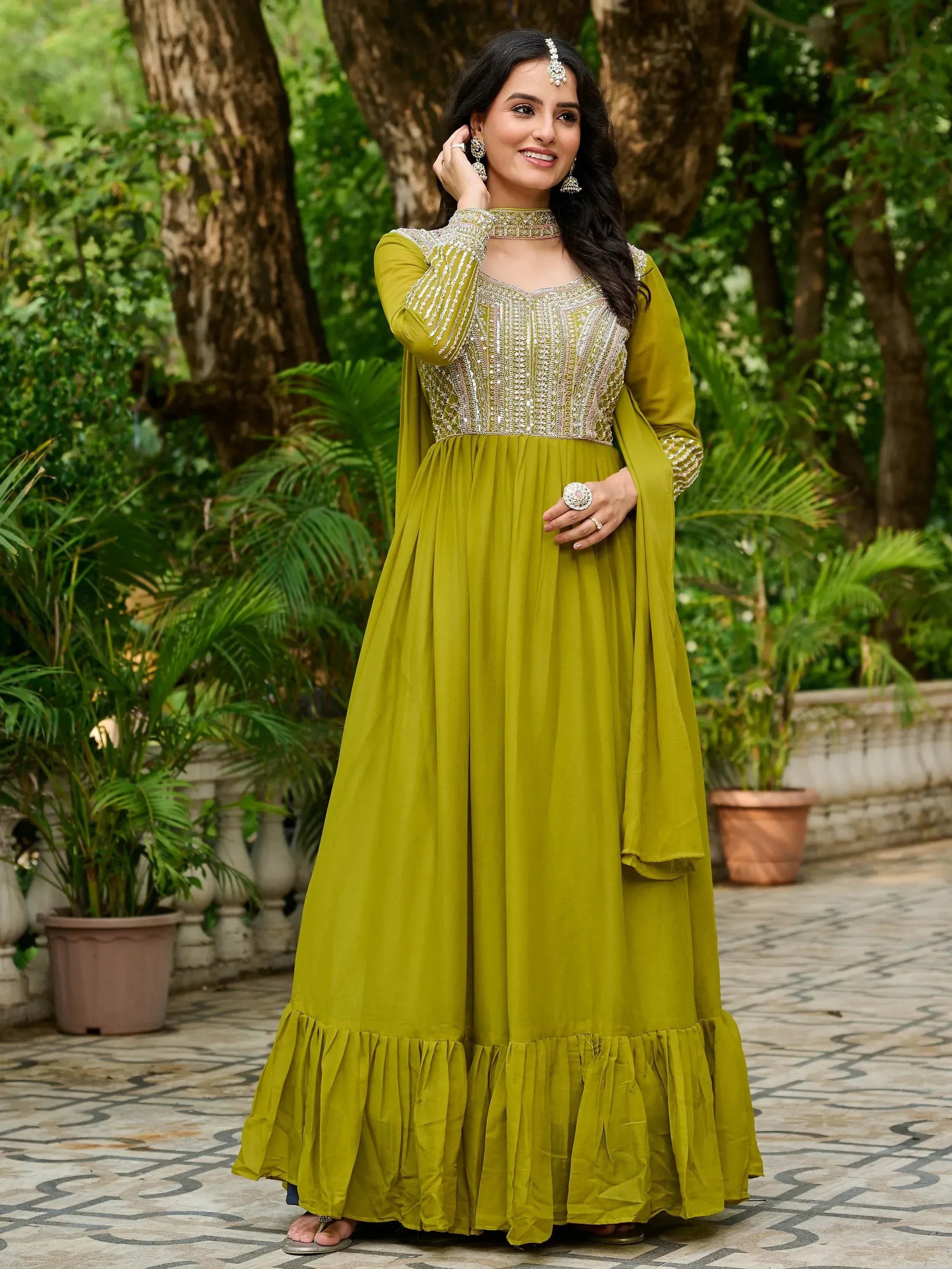 Olive green embroidered anarkali gown with ruffled hem, perfect for Indian ethnic occasions