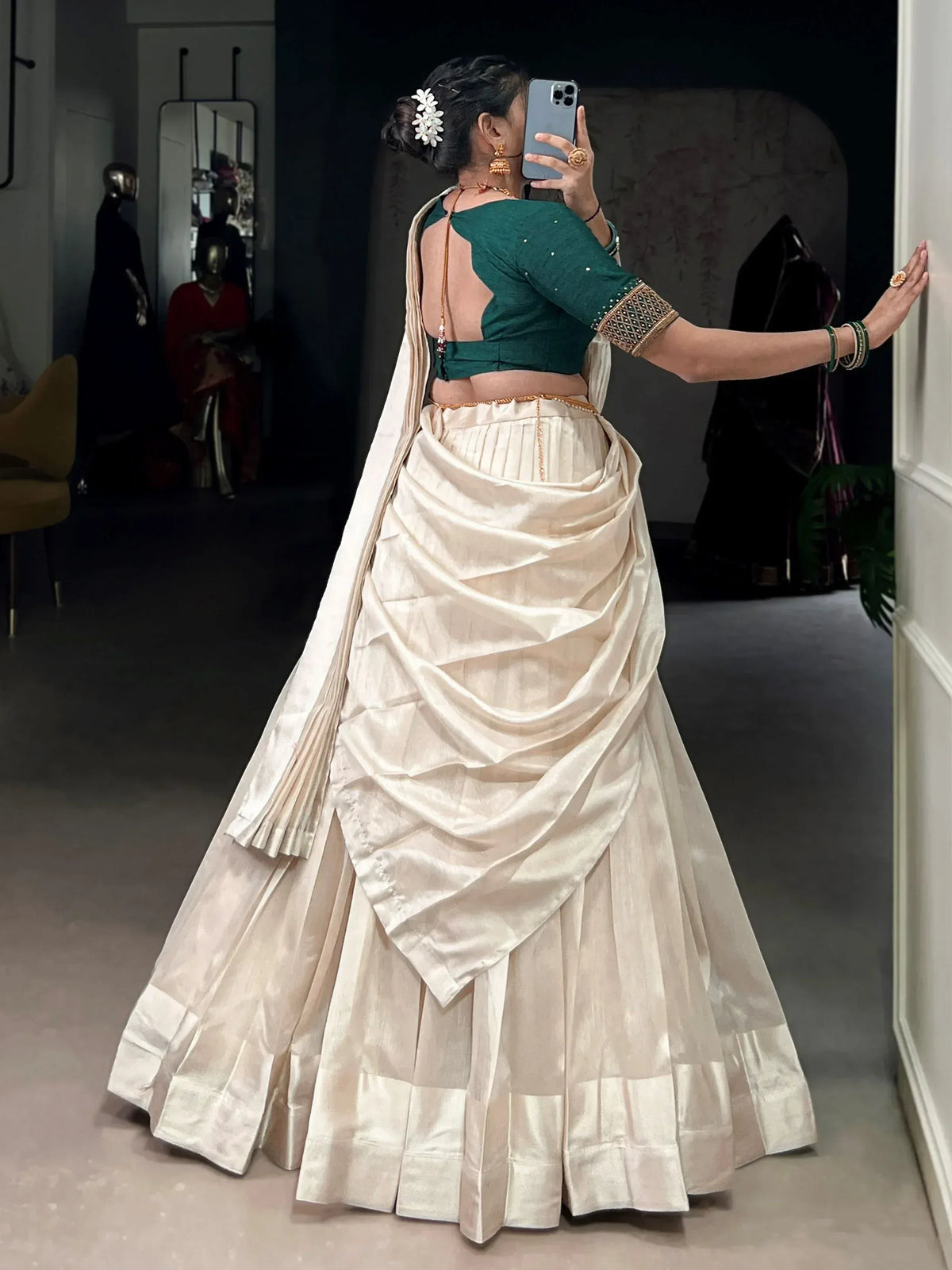 Cream silk lehenga with green blouse, backless design, ethnic wear for weddings
